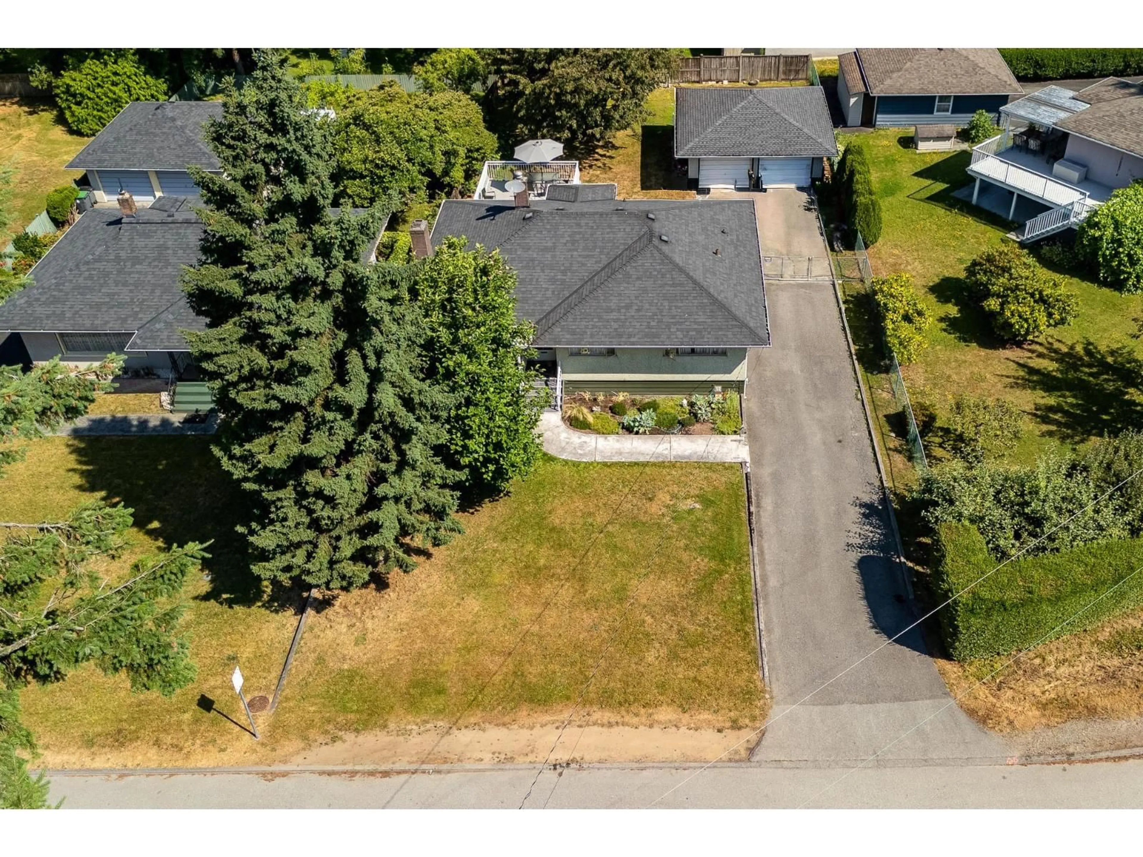 A pic from outside/outdoor area/front of a property/back of a property/a pic from drone, street for 13759 111 AVENUE, Surrey British Columbia V3R2C1