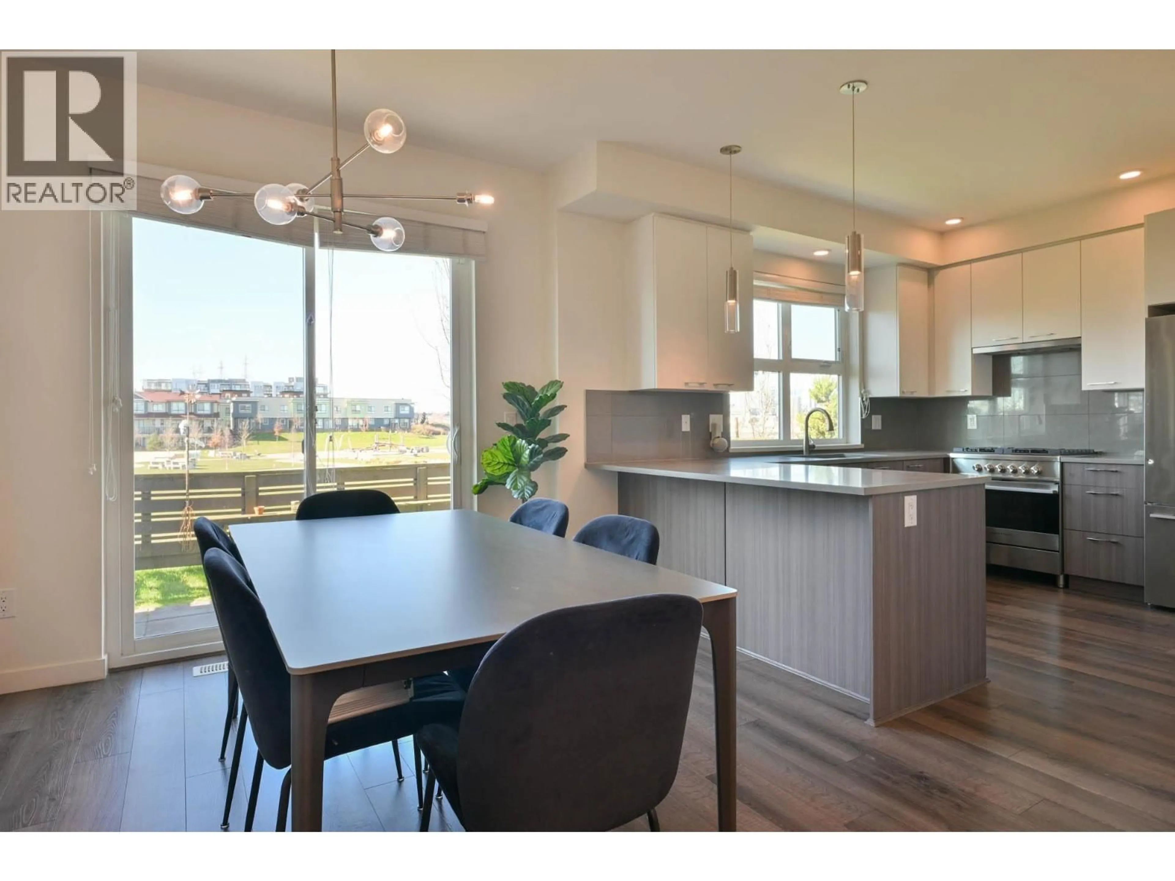 Open concept kitchen, wood/laminate floor for 84 - 10311 RIVER DRIVE, Richmond British Columbia V6X0T2