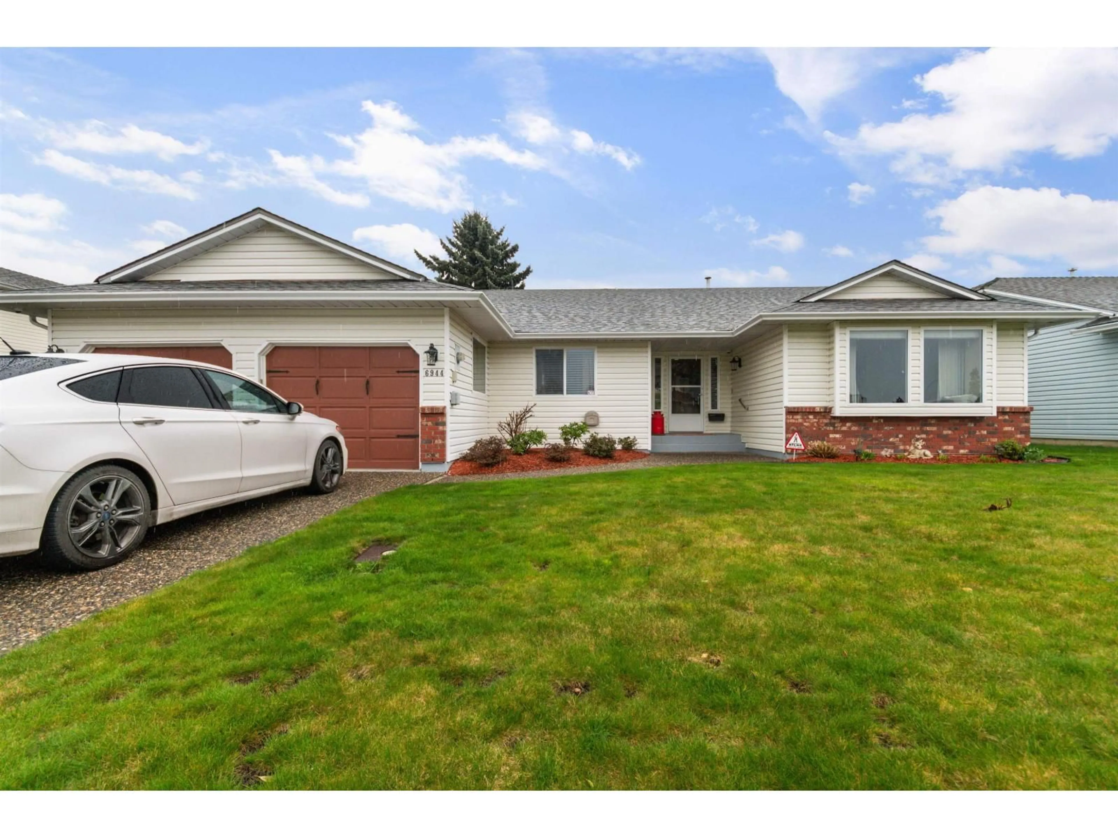 Home with vinyl exterior material, street for 6944 COACH LAMP DRIVE, Chilliwack British Columbia V2R2X6