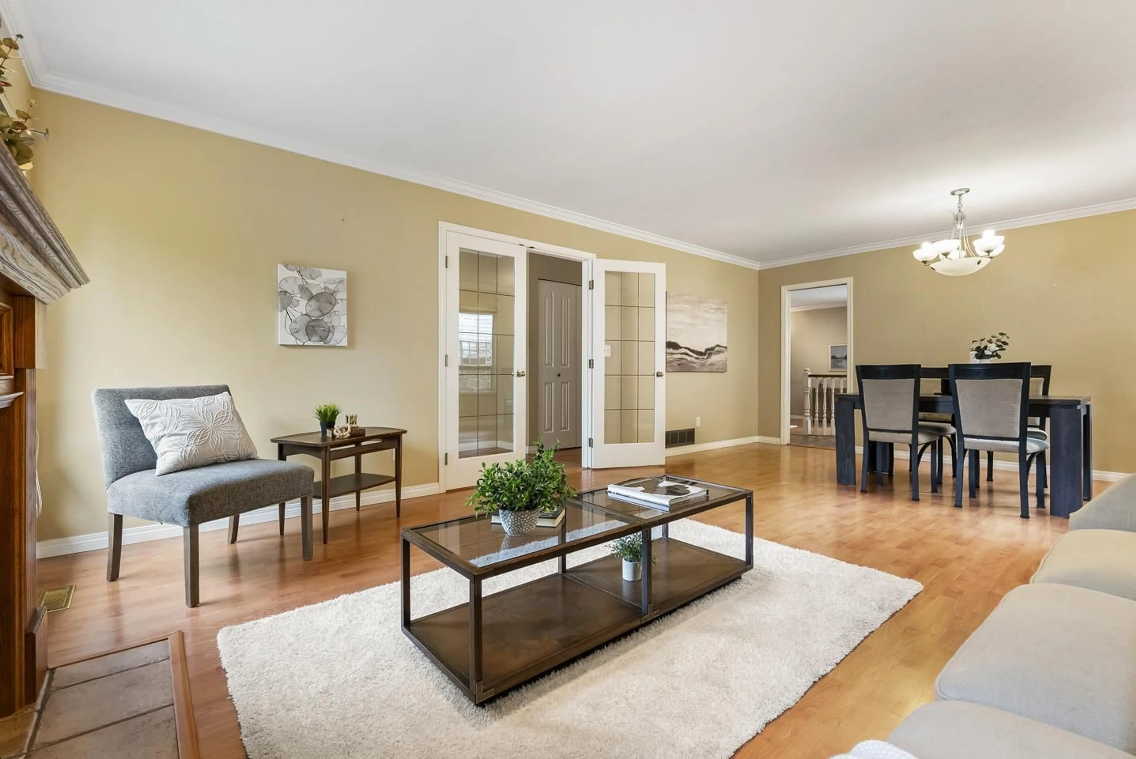 Living room with furniture, wood/laminate floor for 8068 161A STREET, Surrey British Columbia V3S8B5