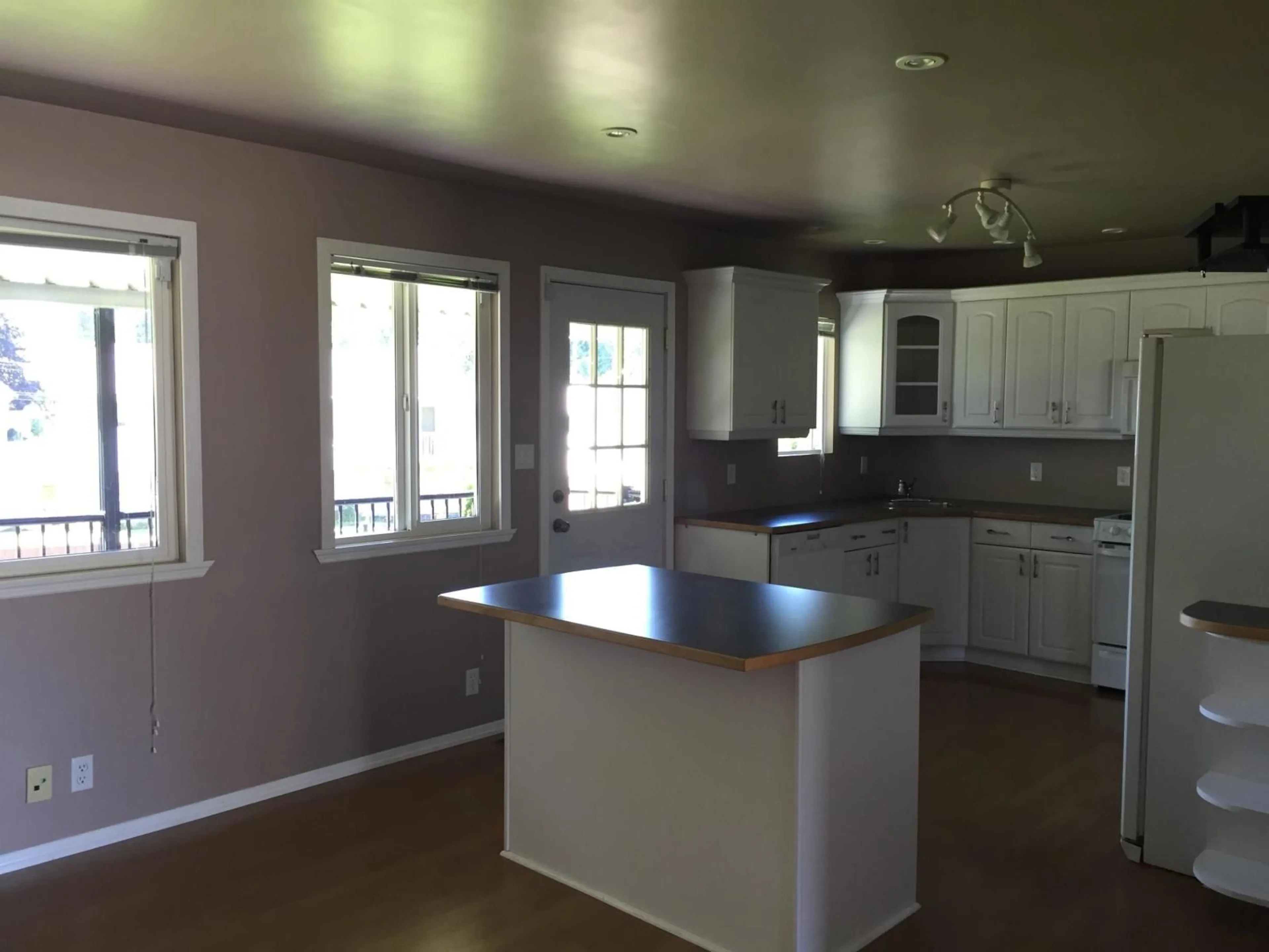 Open concept kitchen, wood/laminate floor for 10837 145 A STREET, Surrey British Columbia V3R3S2
