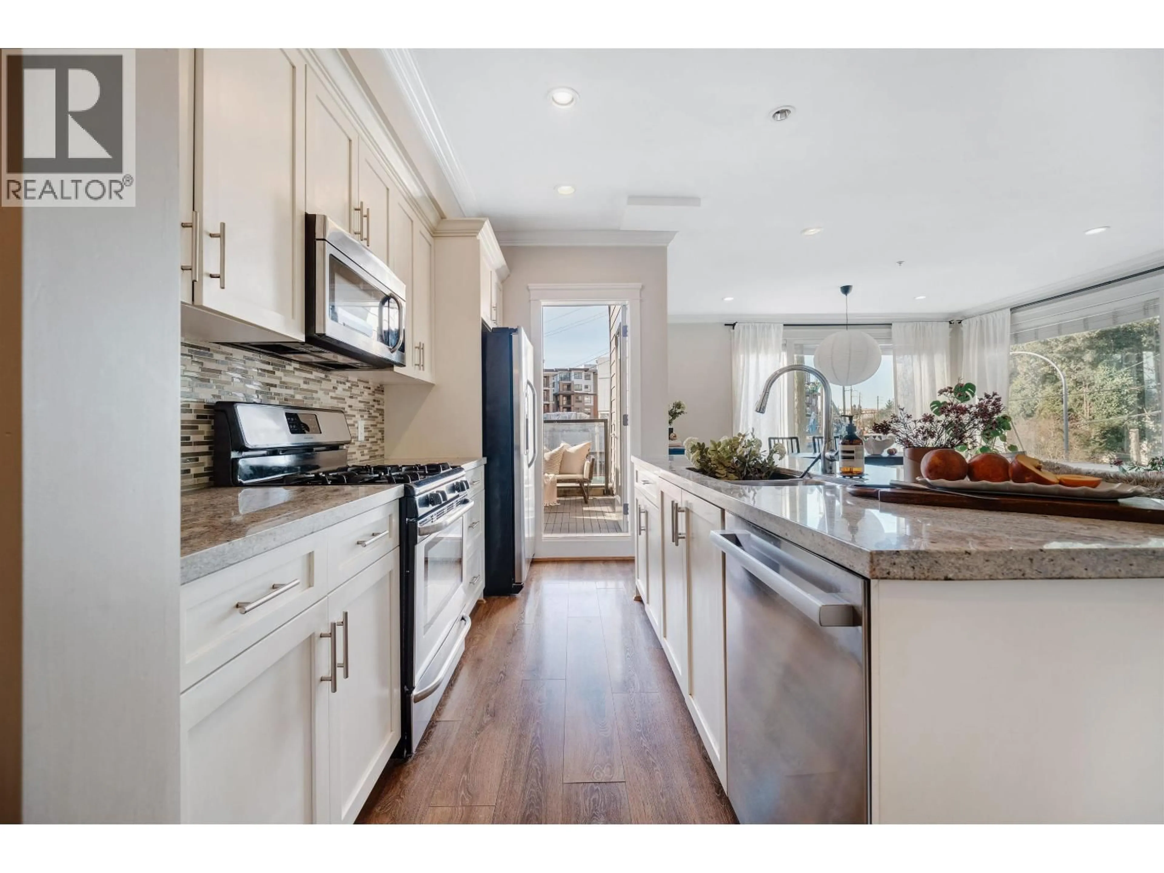 Open concept kitchen, ceramic/tile floor for 308 SEYMOUR RIVER PLACE, North Vancouver British Columbia V7H1S7