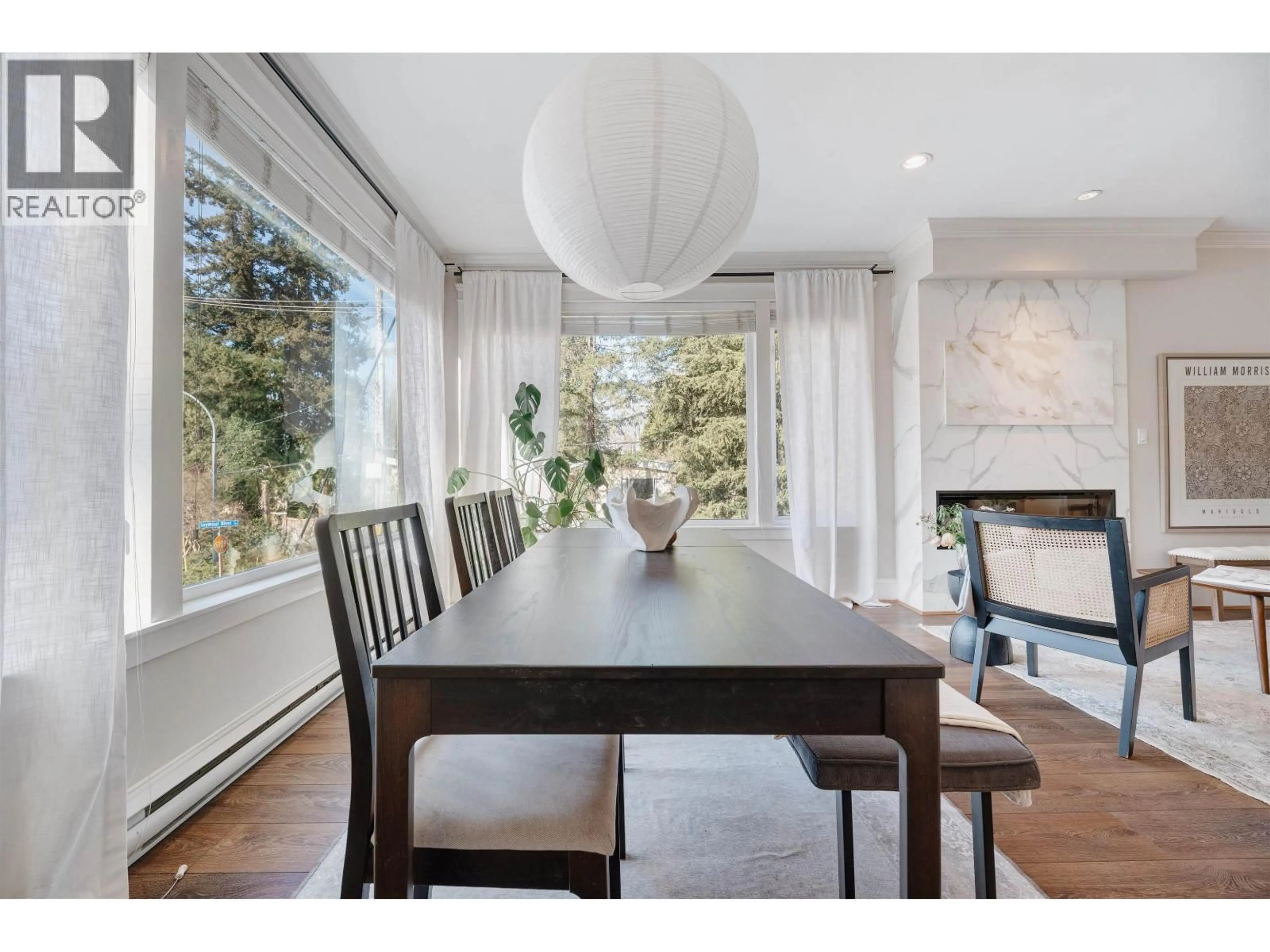 Dining room, wood/laminate floor for 308 SEYMOUR RIVER PLACE, North Vancouver British Columbia V7H1S7