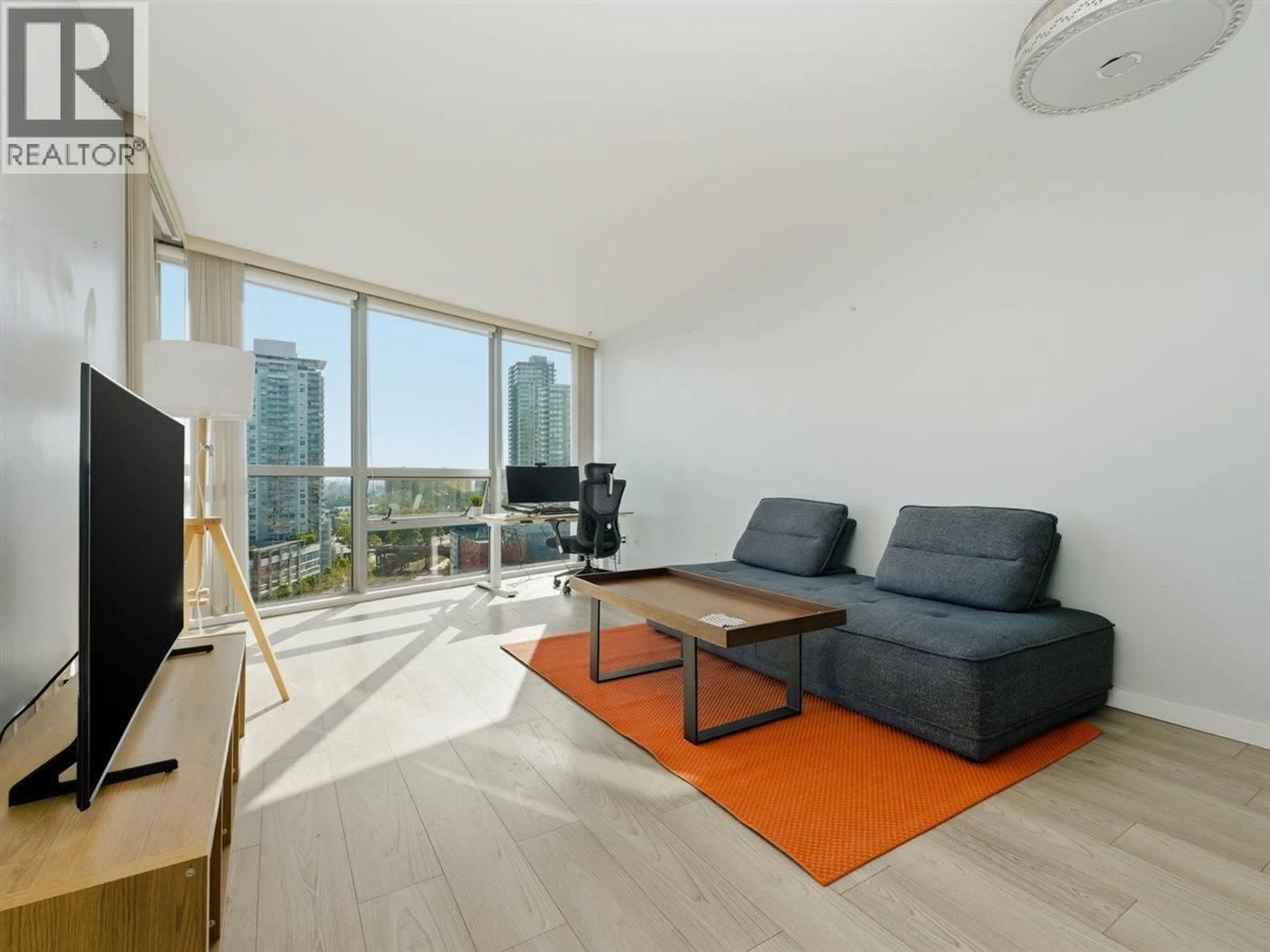 Living room with furniture, wood/laminate floor for 1710 - 14 BEGBIE STREET, New Westminster British Columbia V3M0C4