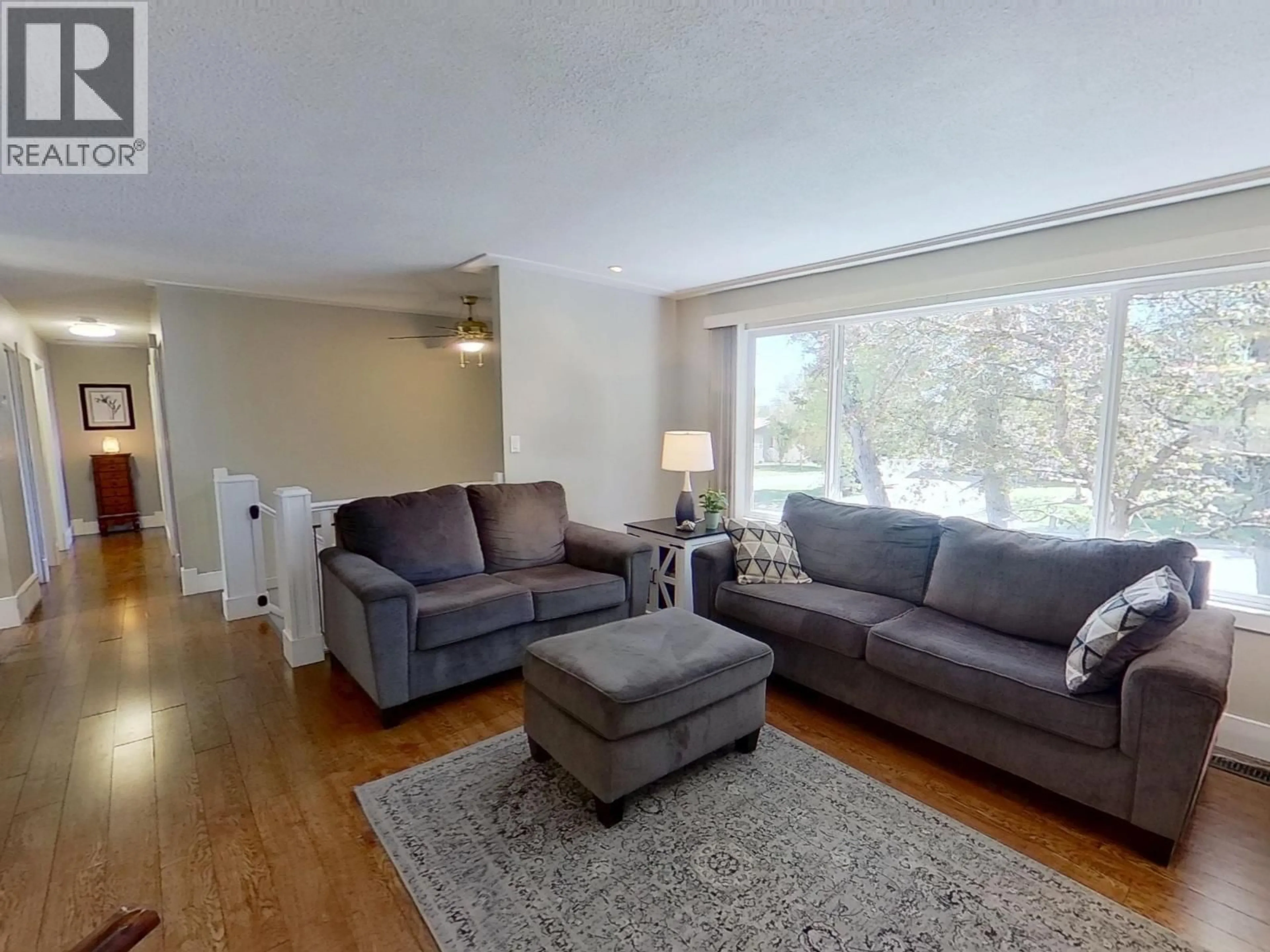 Living room with furniture, wood/laminate floor for 1375 LEWIS DRIVE, Quesnel British Columbia V2J1K9