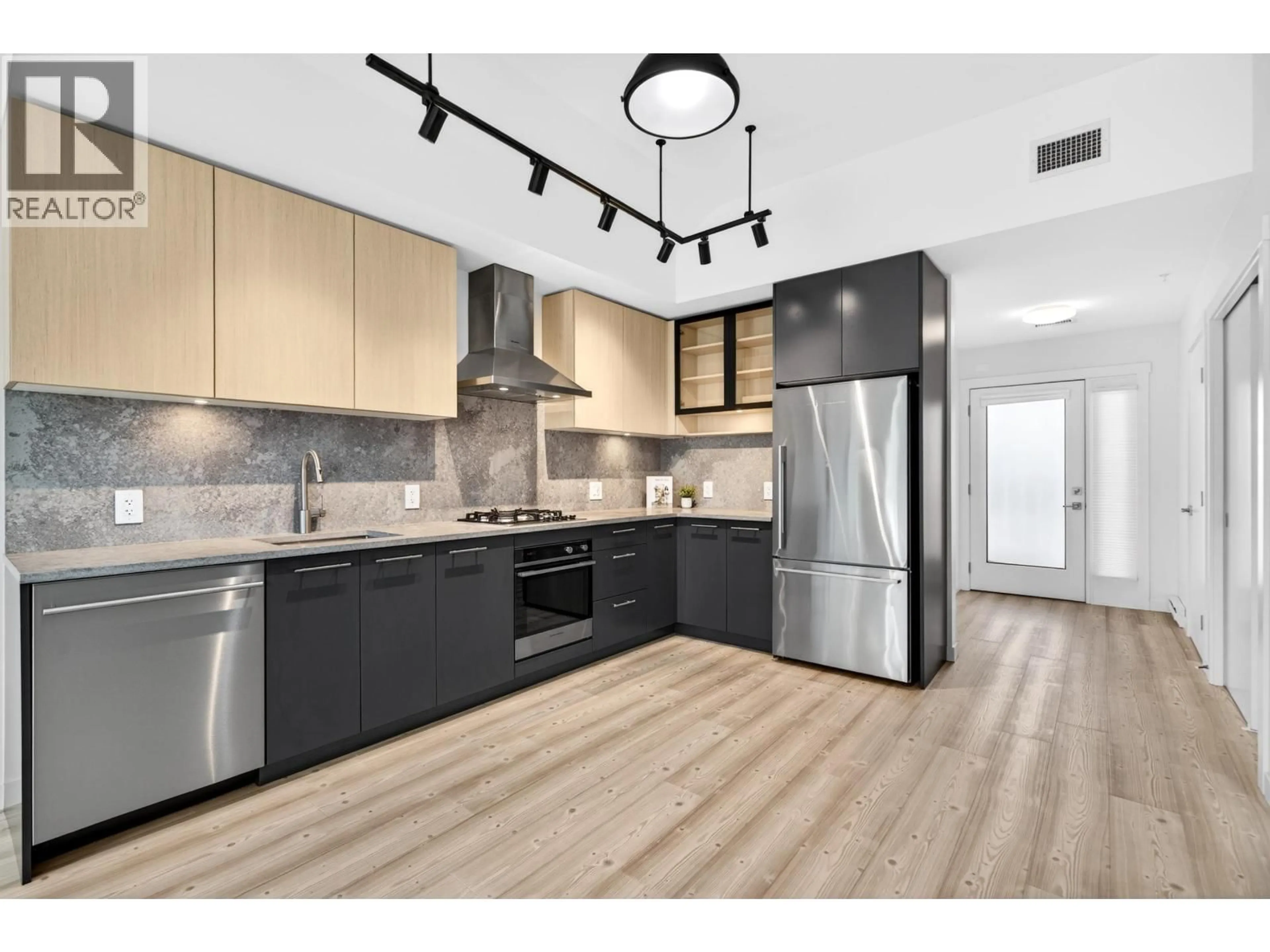 Open concept kitchen, unknown for 311 - 251 BOUNDARY BAY ROAD, Delta British Columbia V4L0B6