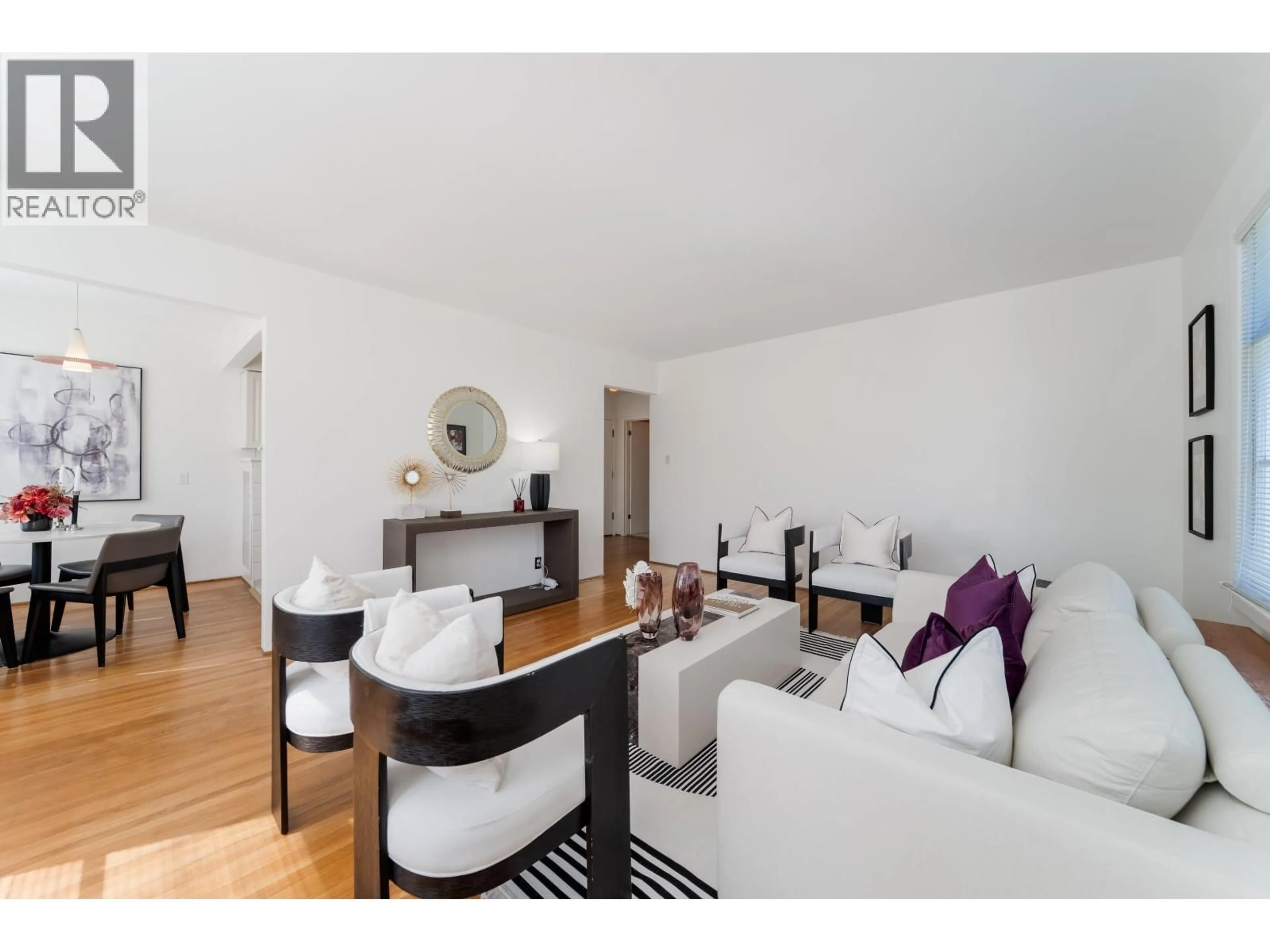 Living room with furniture, wood/laminate floor for 307 - 1565 BURNABY STREET, Vancouver British Columbia V6G1X1
