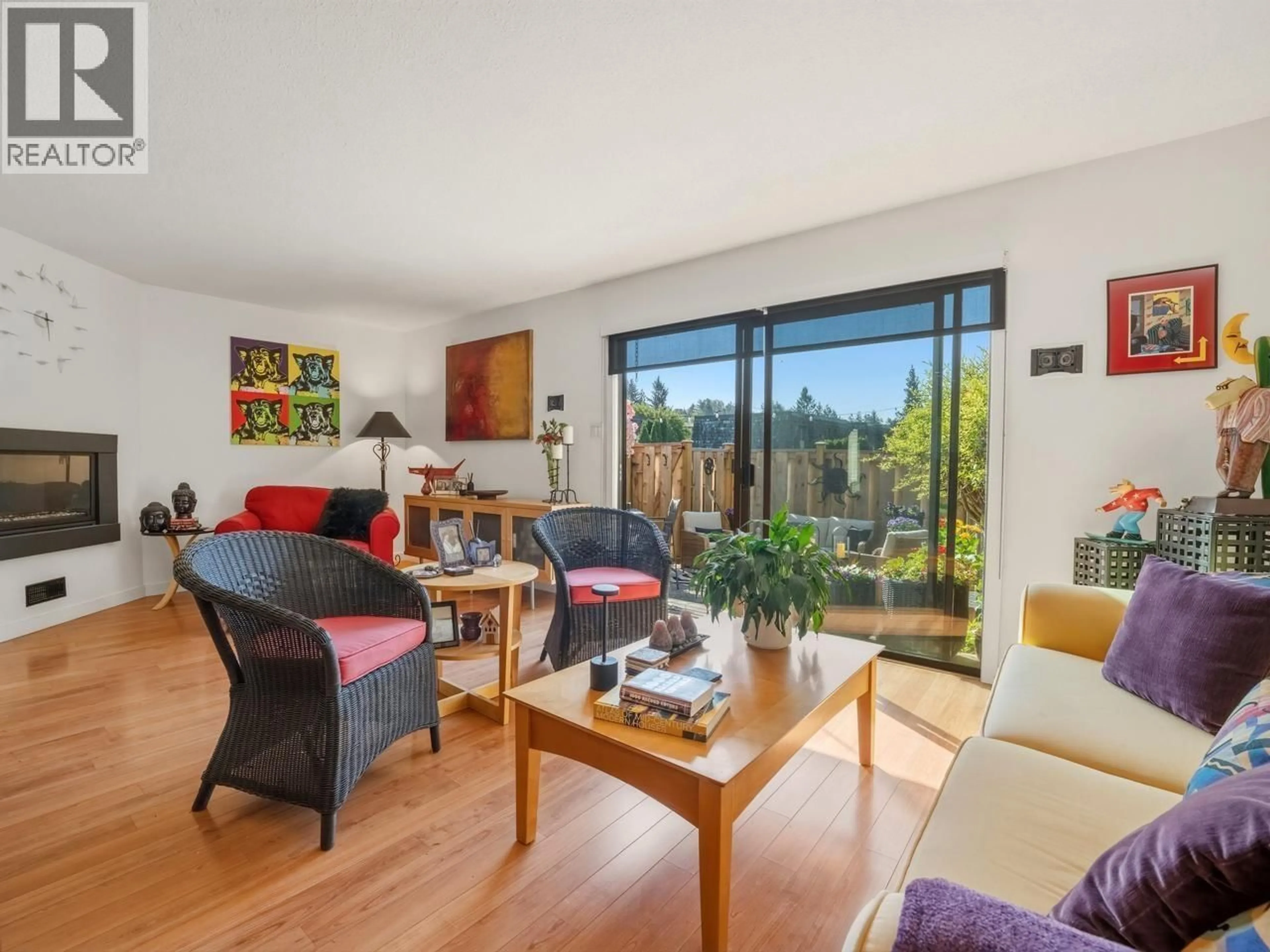 Living room with furniture, wood/laminate floor for 1106 PREMIER STREET, North Vancouver British Columbia V7J2H3