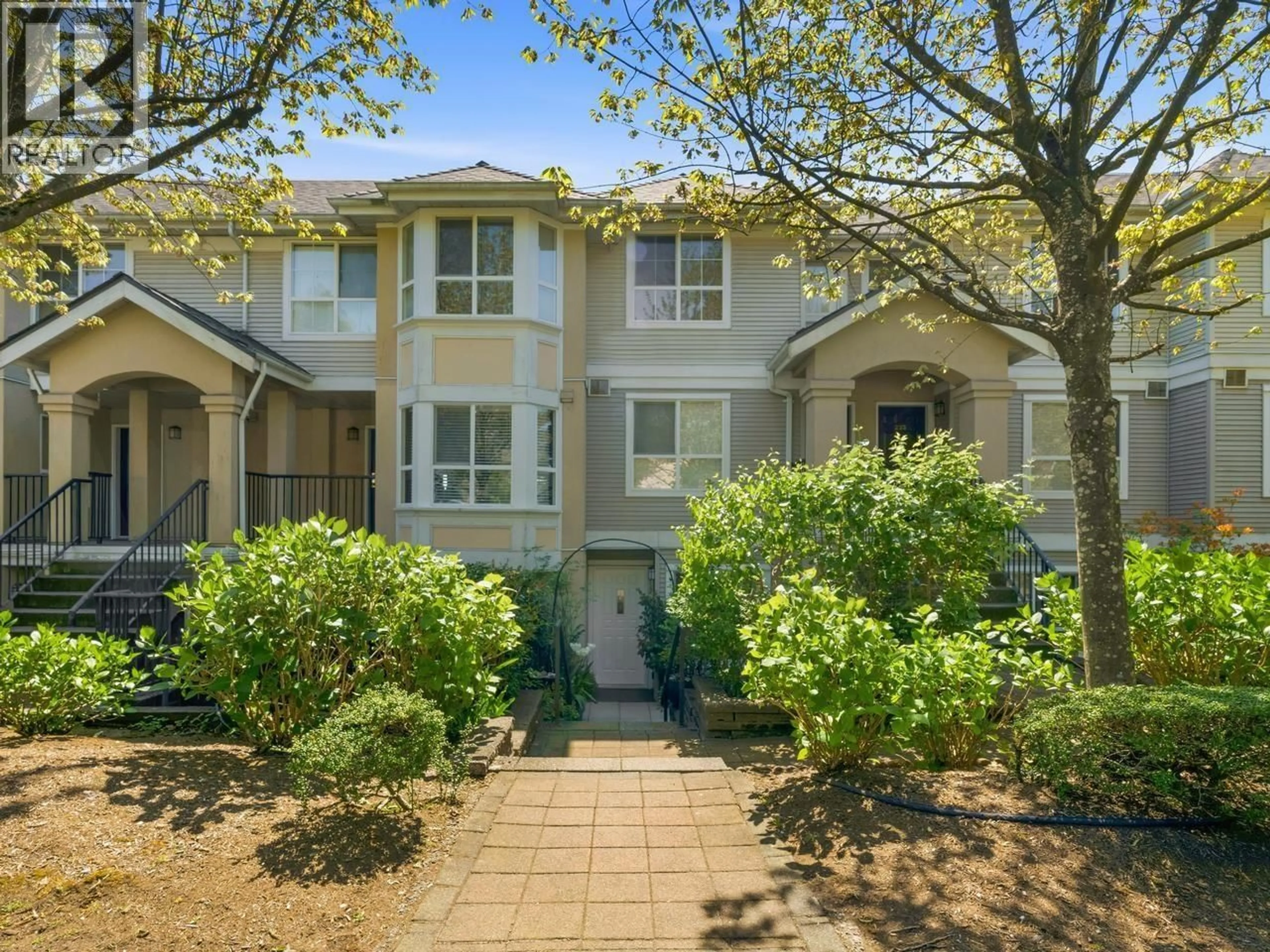 A pic from outside/outdoor area/front of a property/back of a property/a pic from drone, street for 134 - 1408 CARTIER AVENUE, Coquitlam British Columbia V3K7A4