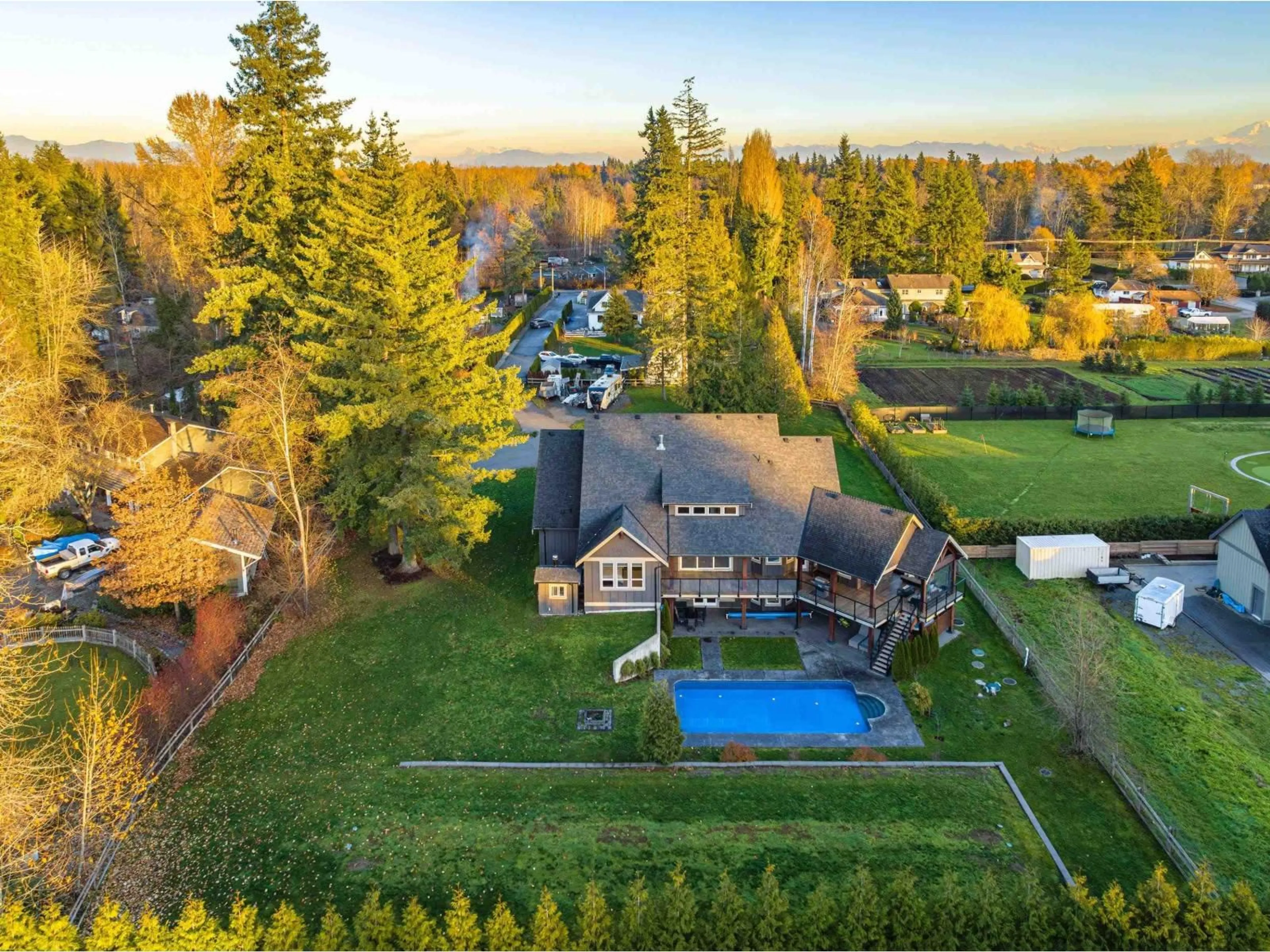 A pic from outside/outdoor area/front of a property/back of a property/a pic from drone, unknown for 4471 248 STREET, Langley British Columbia V4W1E1