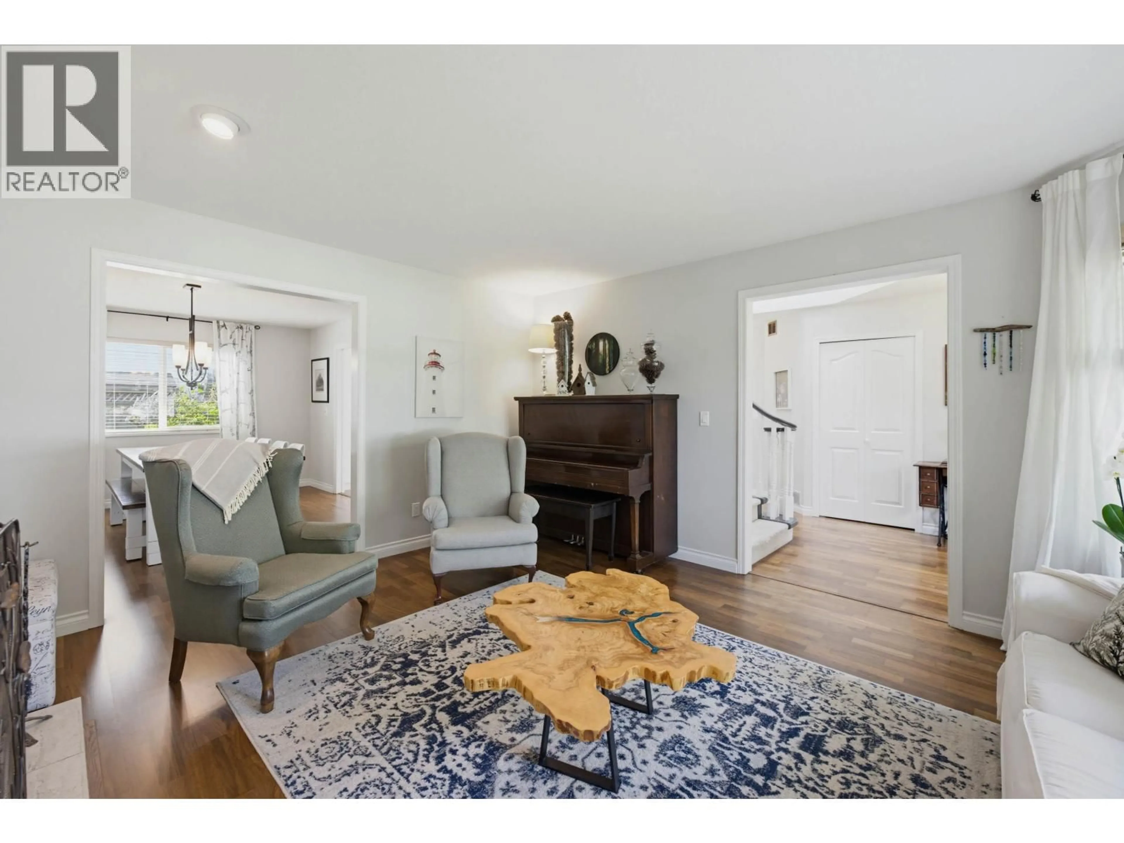 Living room with furniture, wood/laminate floor for 5954 49 AVENUE, Delta British Columbia V4K4L4