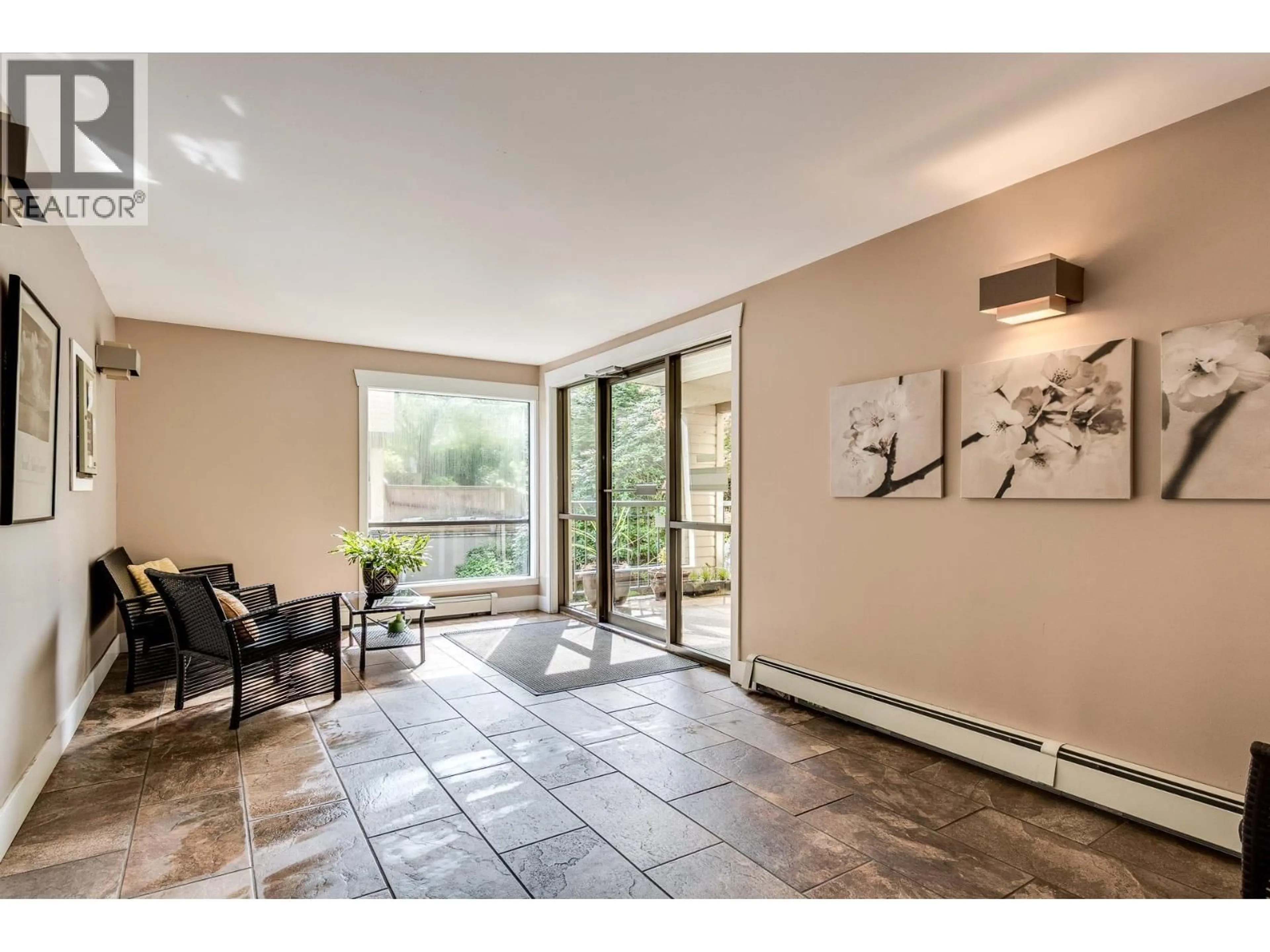 Indoor foyer for 212 - 3275 MOUNTAIN HIGHWAY, North Vancouver British Columbia V7K2H4