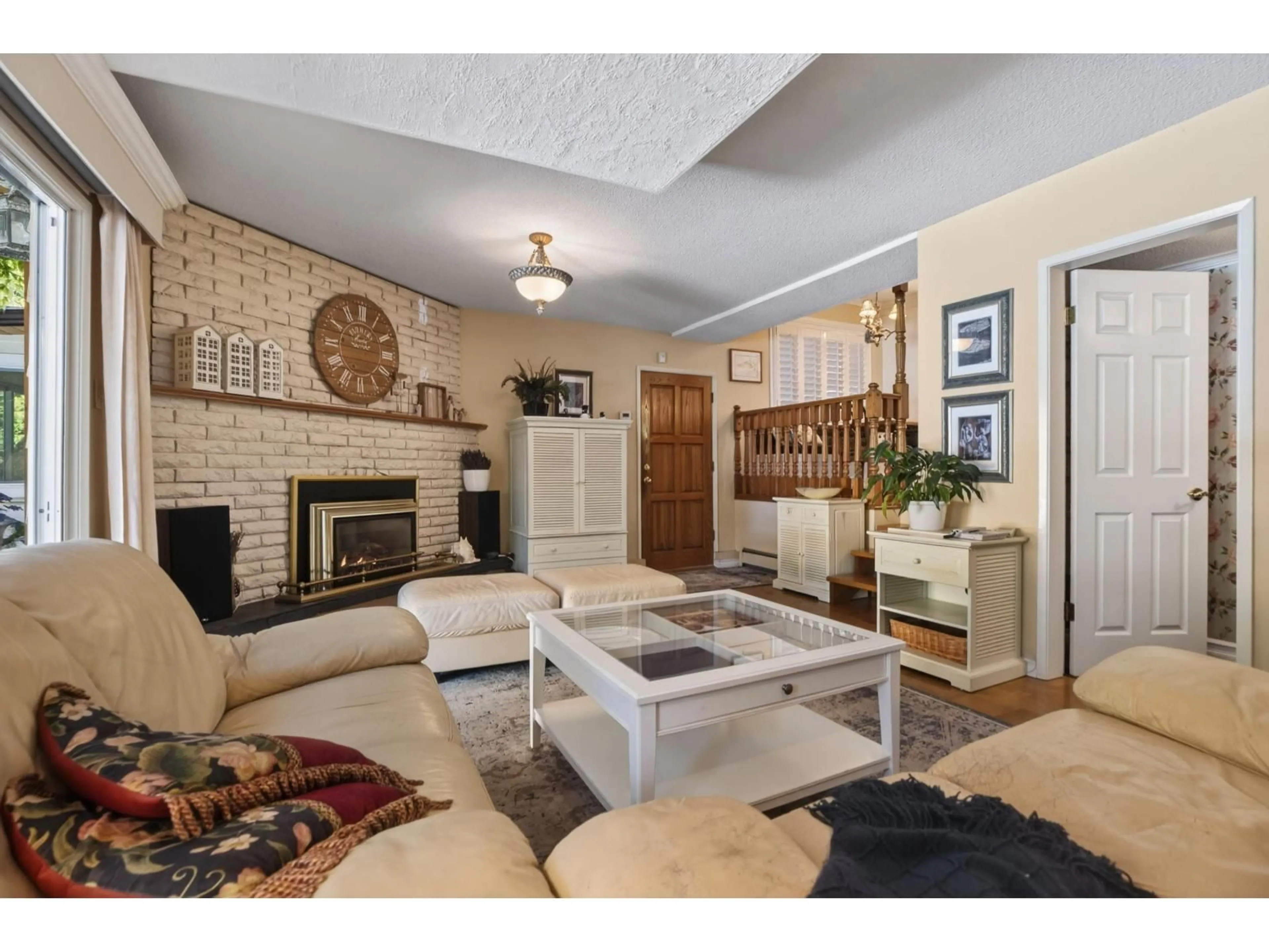Living room with furniture, ceramic/tile floor for 10877 64A AVENUE, Delta British Columbia V4E1E2
