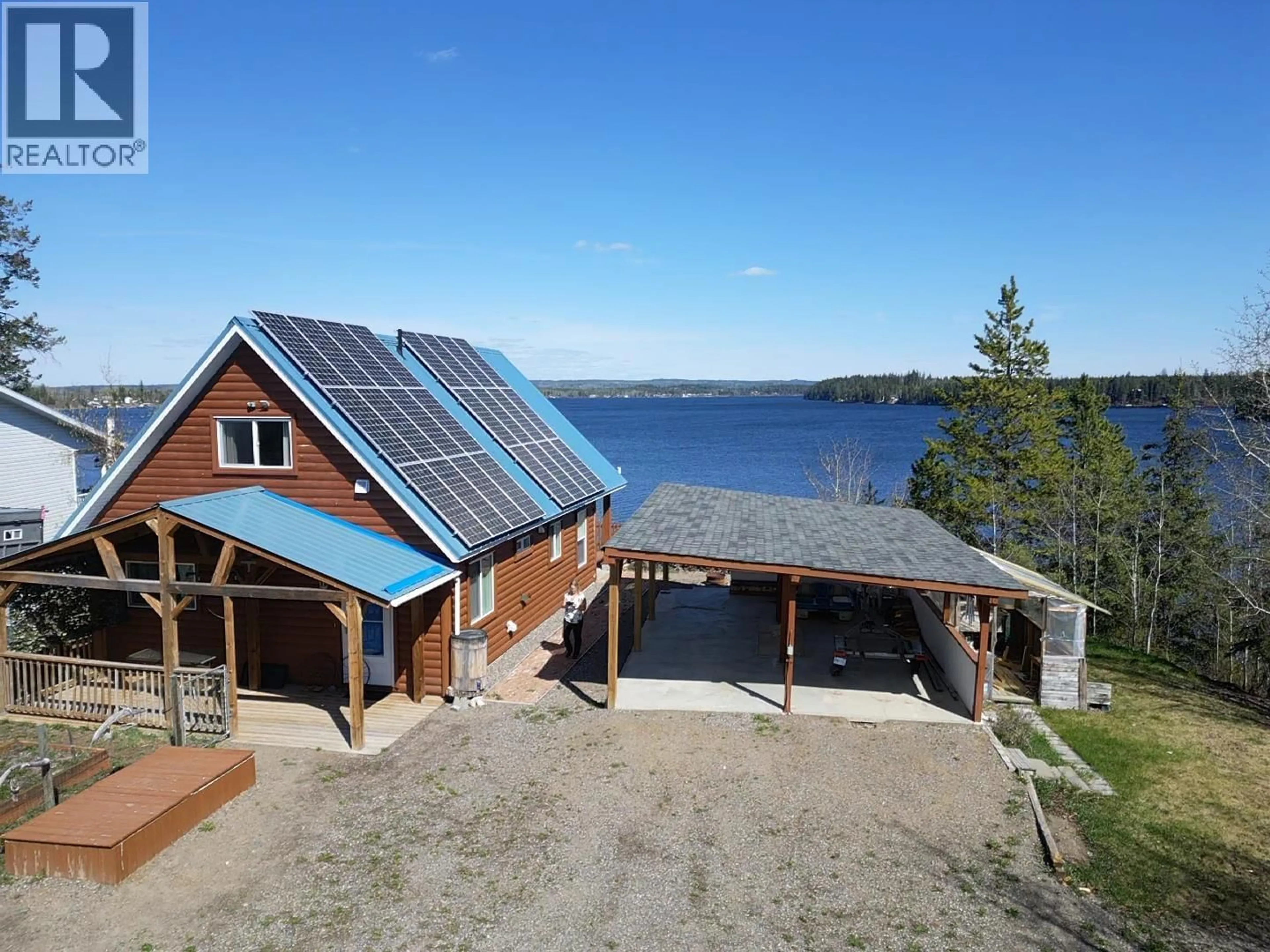 A pic from outside/outdoor area/front of a property/back of a property/a pic from drone, water/lake/river/ocean view for 5200 MEIER SUBDIVISION ROAD, Cluculz Lake British Columbia V0J3A3