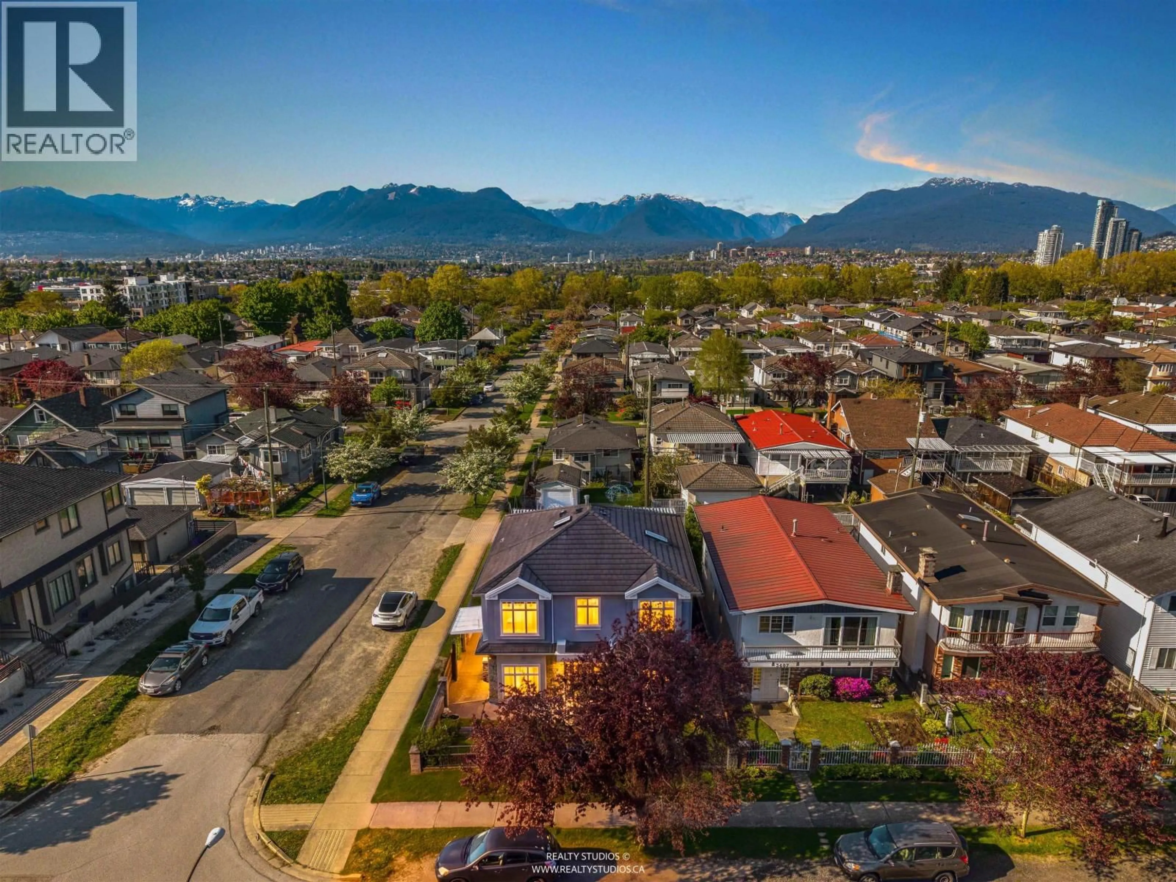 A pic from outside/outdoor area/front of a property/back of a property/a pic from drone, mountain view for 3403 26TH AVENUE, Vancouver British Columbia V5R1M2