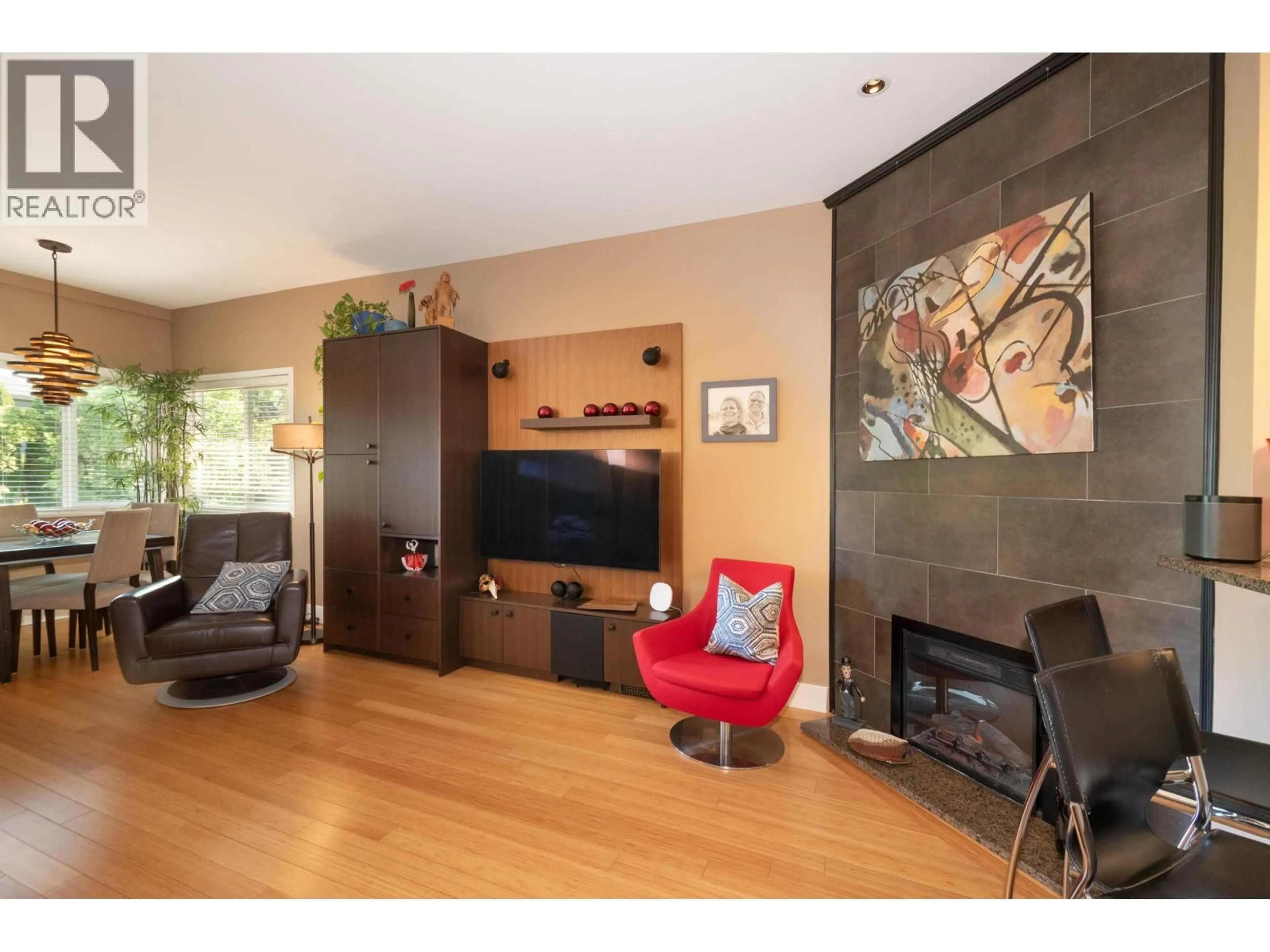Living room with furniture, wood/laminate floor for 4961 ST. CATHERINES STREET, Vancouver British Columbia V5W3E9