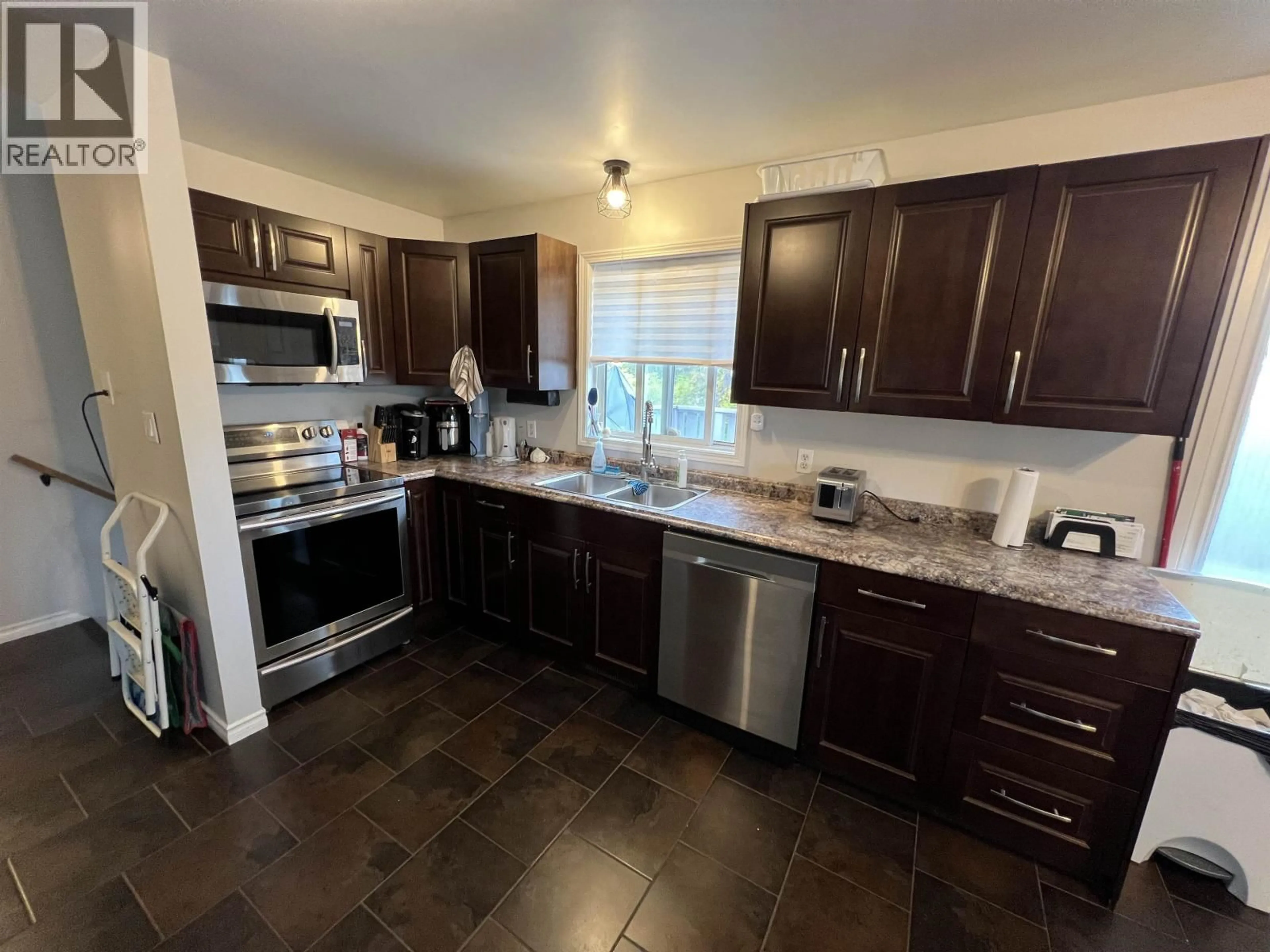 Open concept kitchen, ceramic/tile floor for 5524 48 STREET, Fort Nelson British Columbia V0C1R0