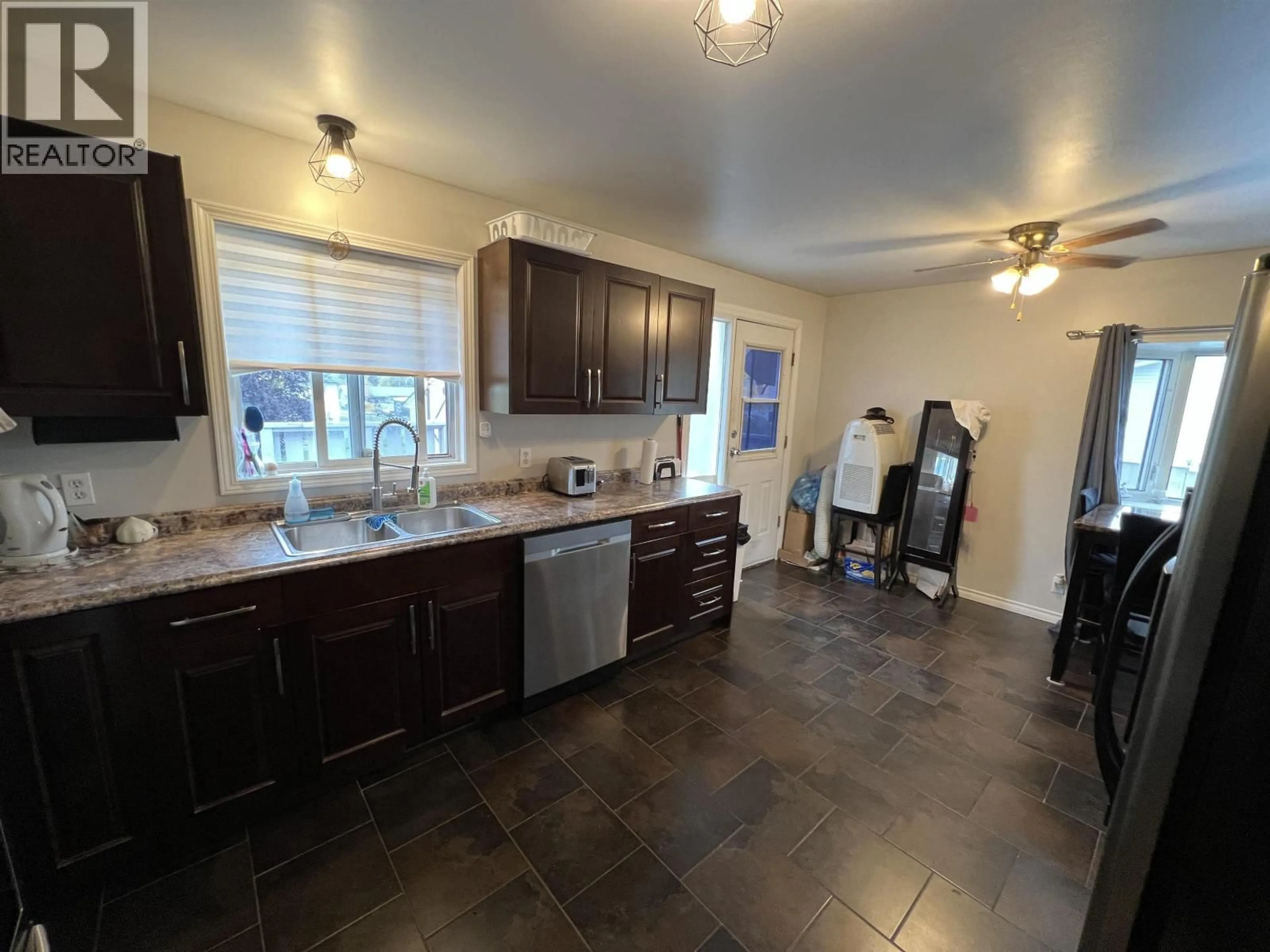 Open concept kitchen, ceramic/tile floor for 5524 48 STREET, Fort Nelson British Columbia V0C1R0