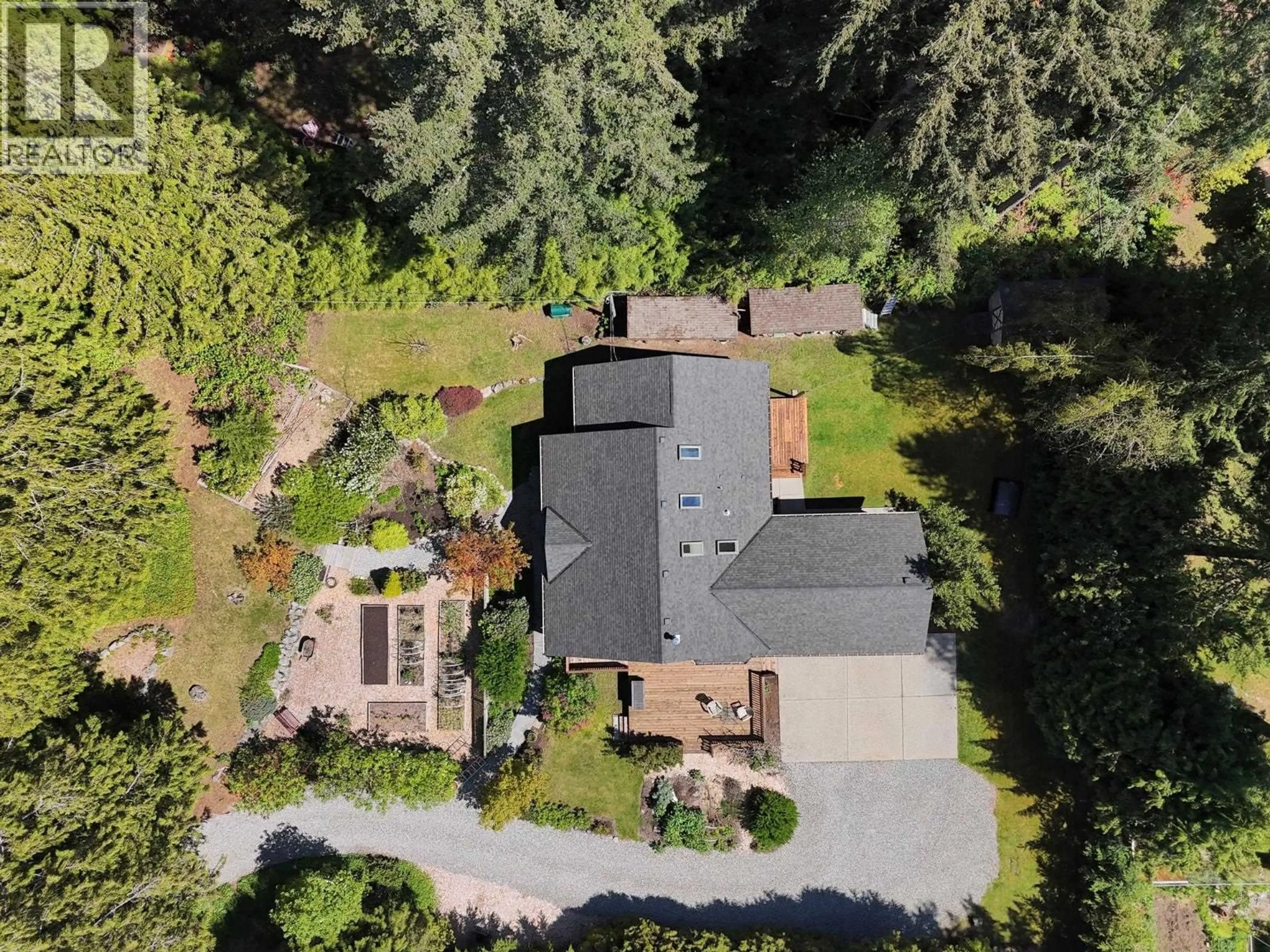A pic from outside/outdoor area/front of a property/back of a property/a pic from drone, street for 8071 WILDWOOD ROAD, Halfmoon Bay British Columbia V7Z1A8