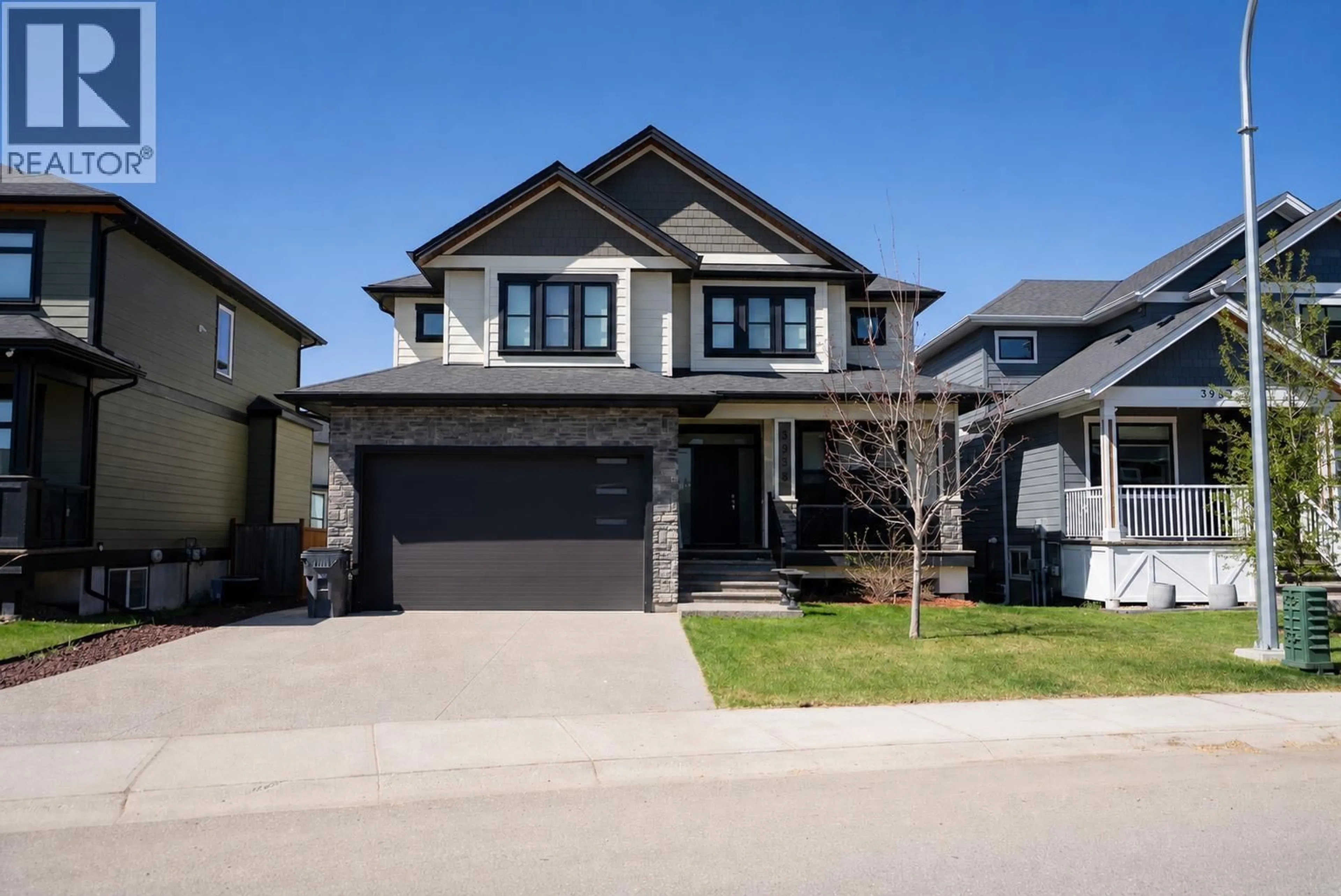 Home with vinyl exterior material, street for 3938 AREND DRIVE, Prince George British Columbia V2K0B1