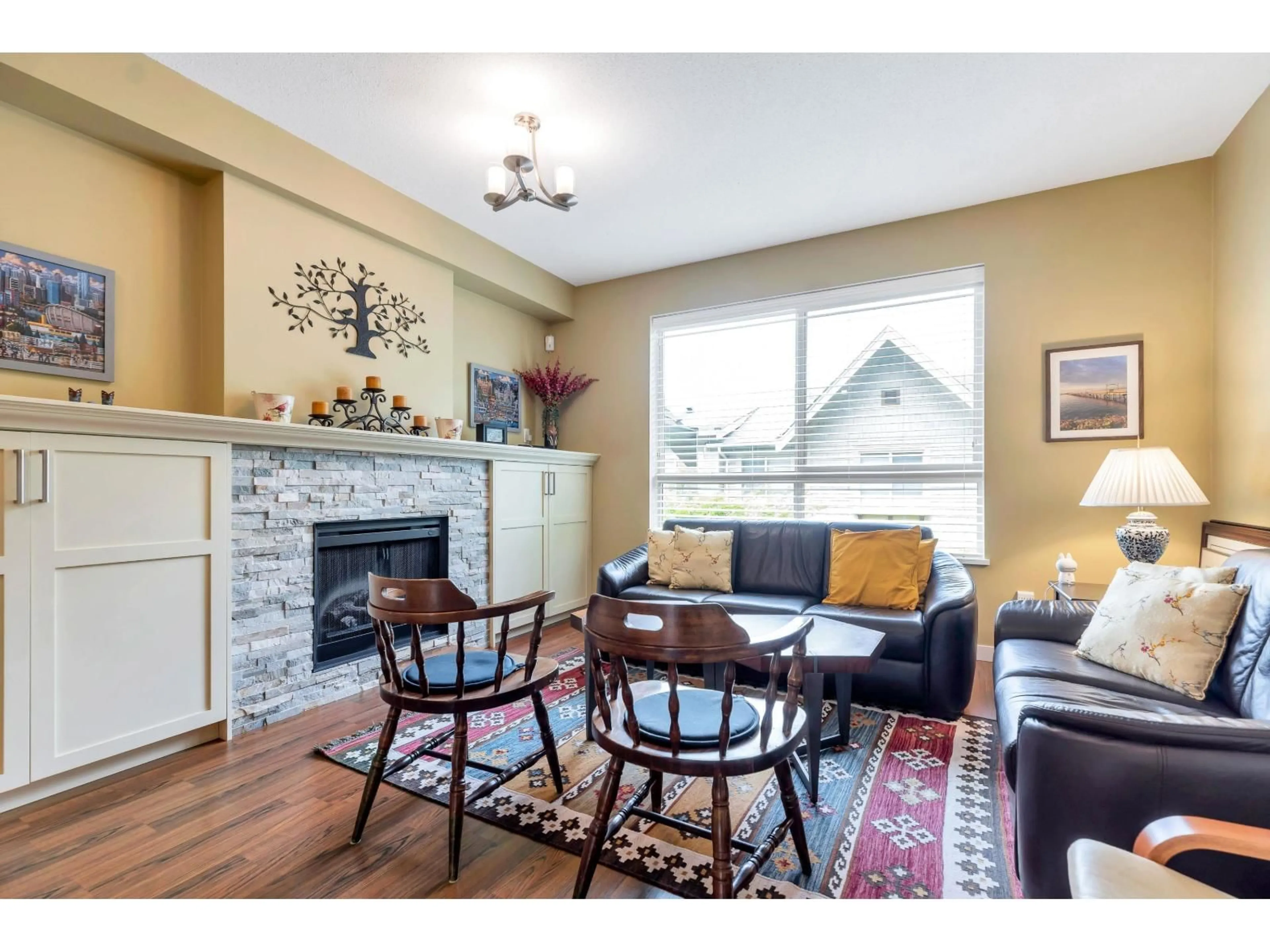 Living room with furniture, wood/laminate floor for 38 - 2738 158 STREET, Surrey British Columbia V3S3K3