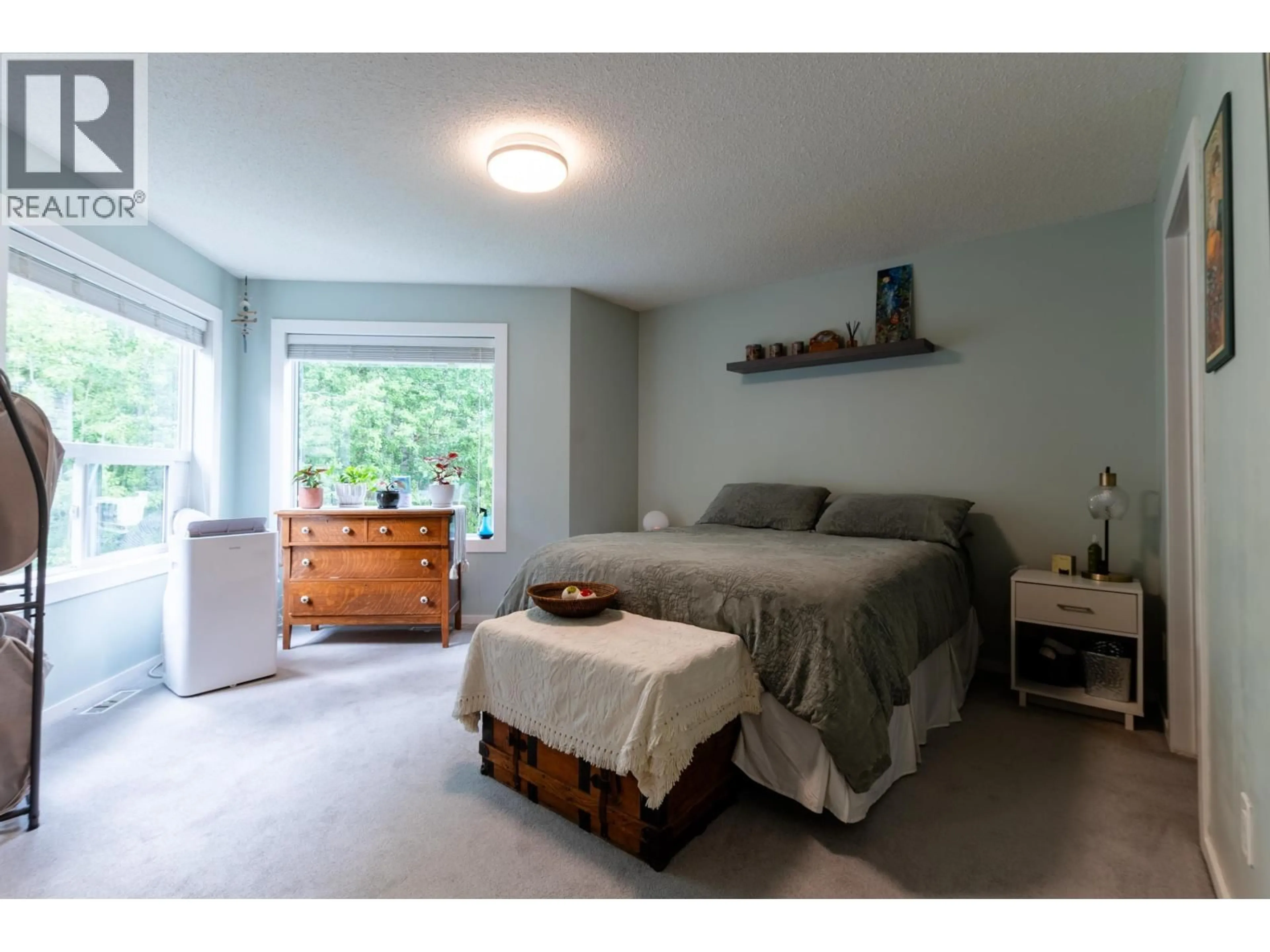 Bedroom with bed, wood/laminate floor for 157 - 3233 MCGILL CRESCENT, Prince George British Columbia V2N2T4