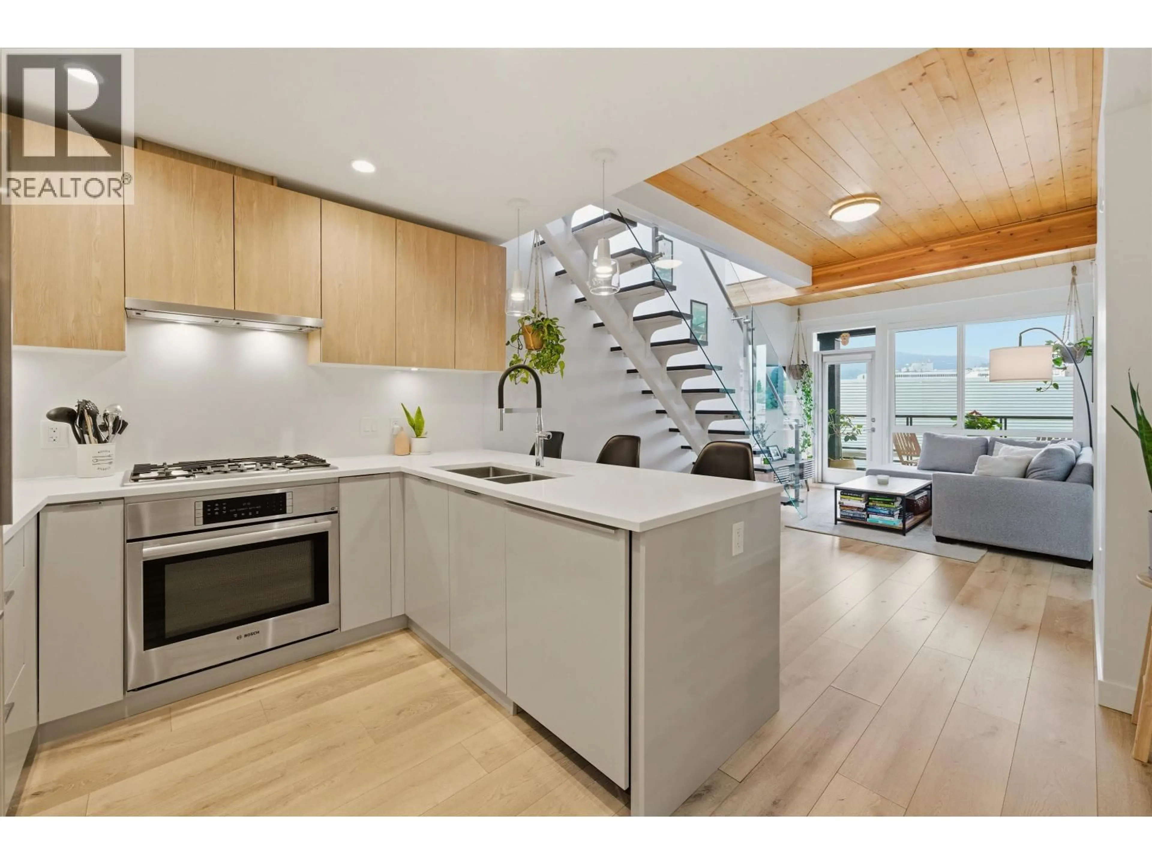 Open concept kitchen, unknown for 607 - 128 8TH STREET, North Vancouver British Columbia V7L0H2