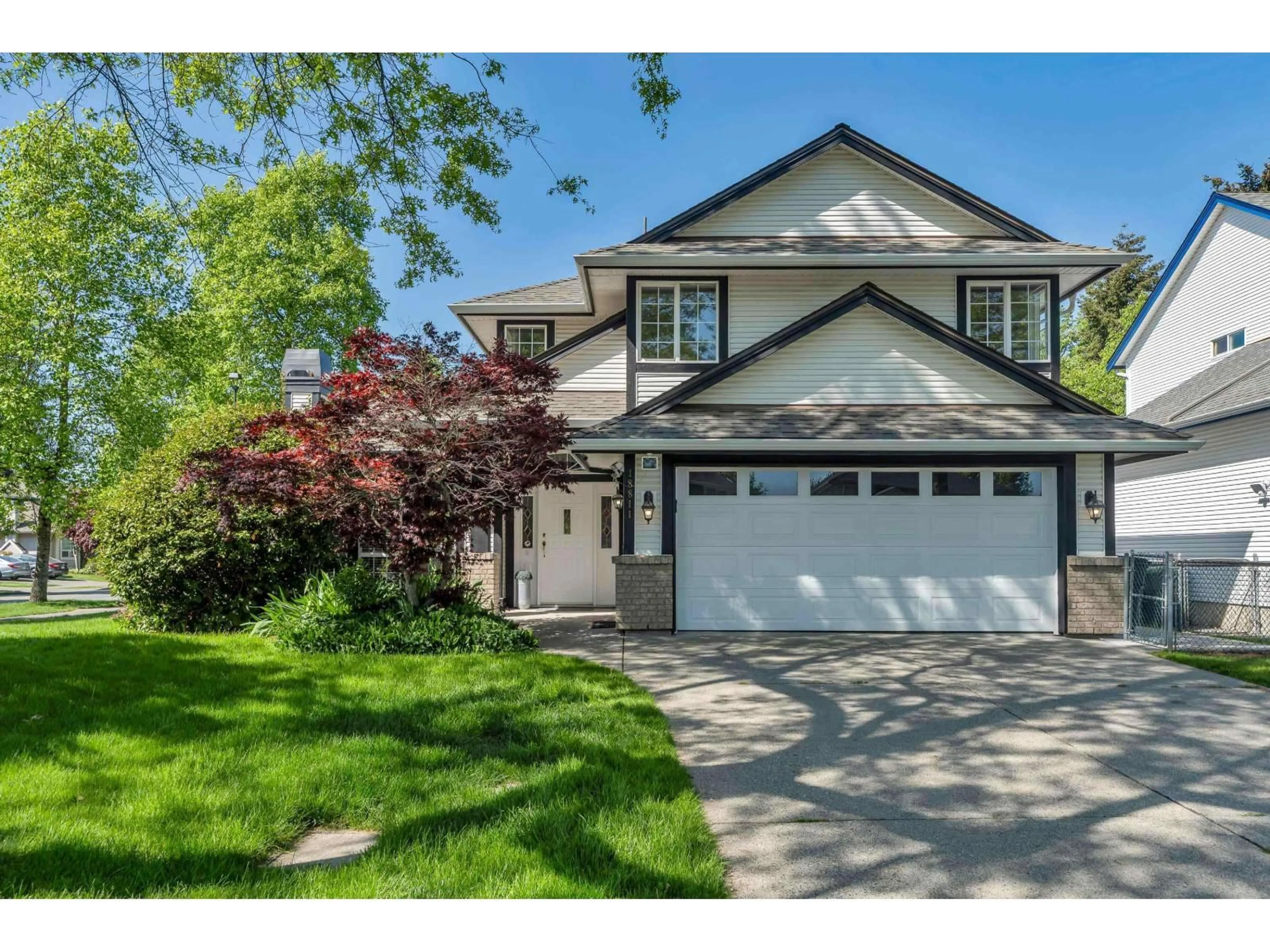 Home with vinyl exterior material, street for 18811 65 AVENUE, Surrey British Columbia V3S8V1