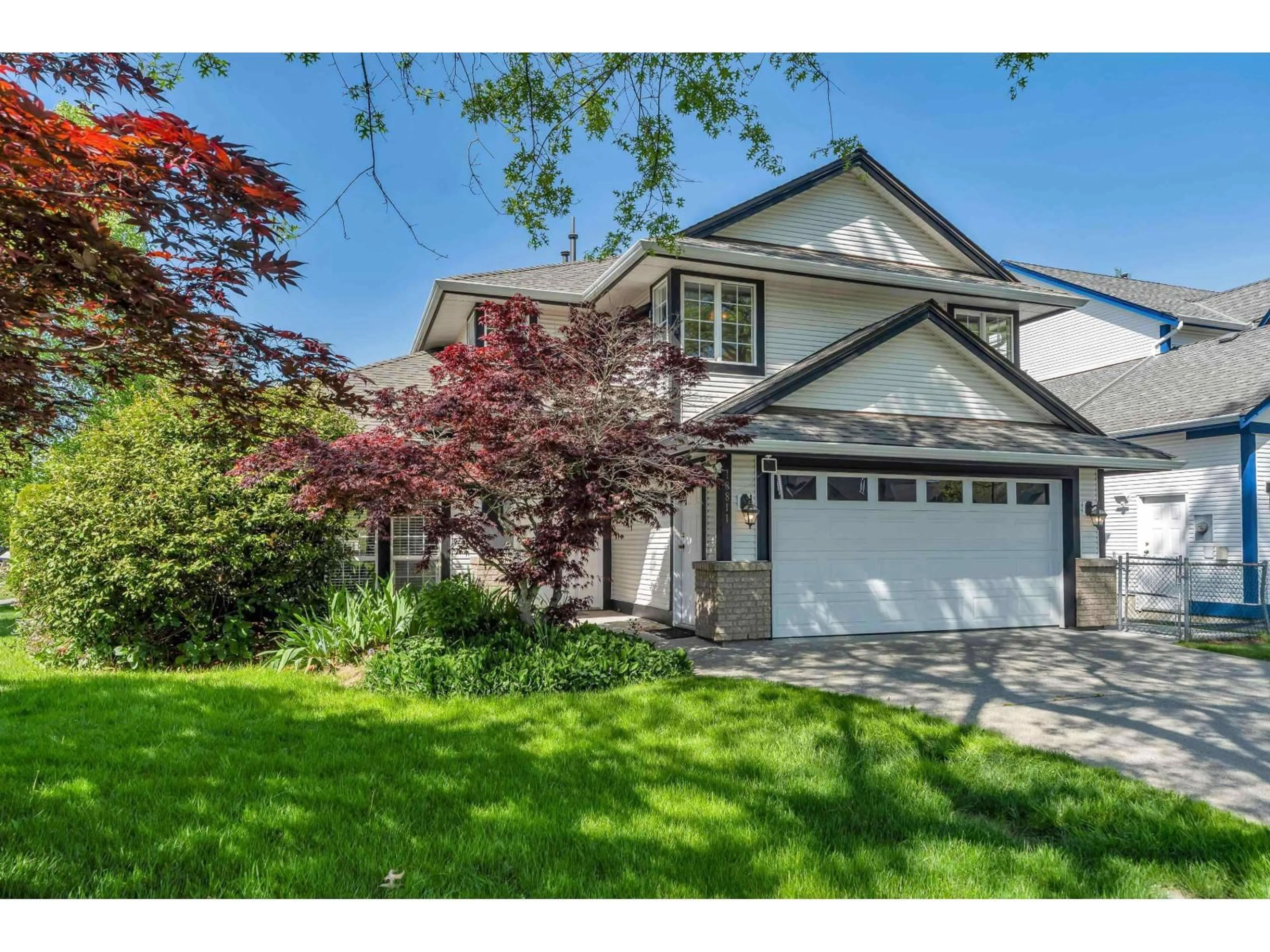 Home with vinyl exterior material, street for 18811 65 AVENUE, Surrey British Columbia V3S8V1