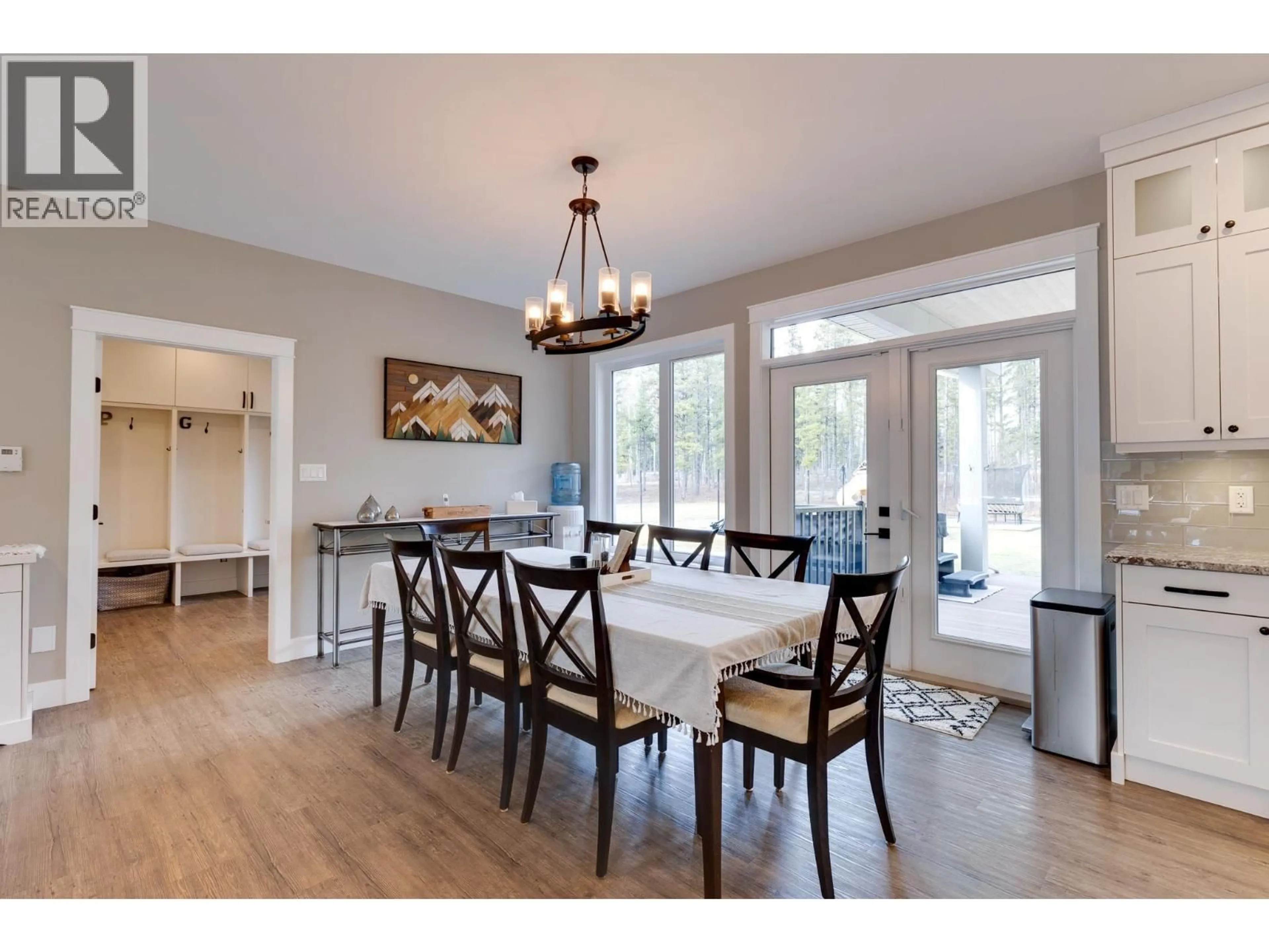 Dining room, wood/laminate floor for 3820 REEVES DRIVE, Prince George British Columbia V2N5Y2