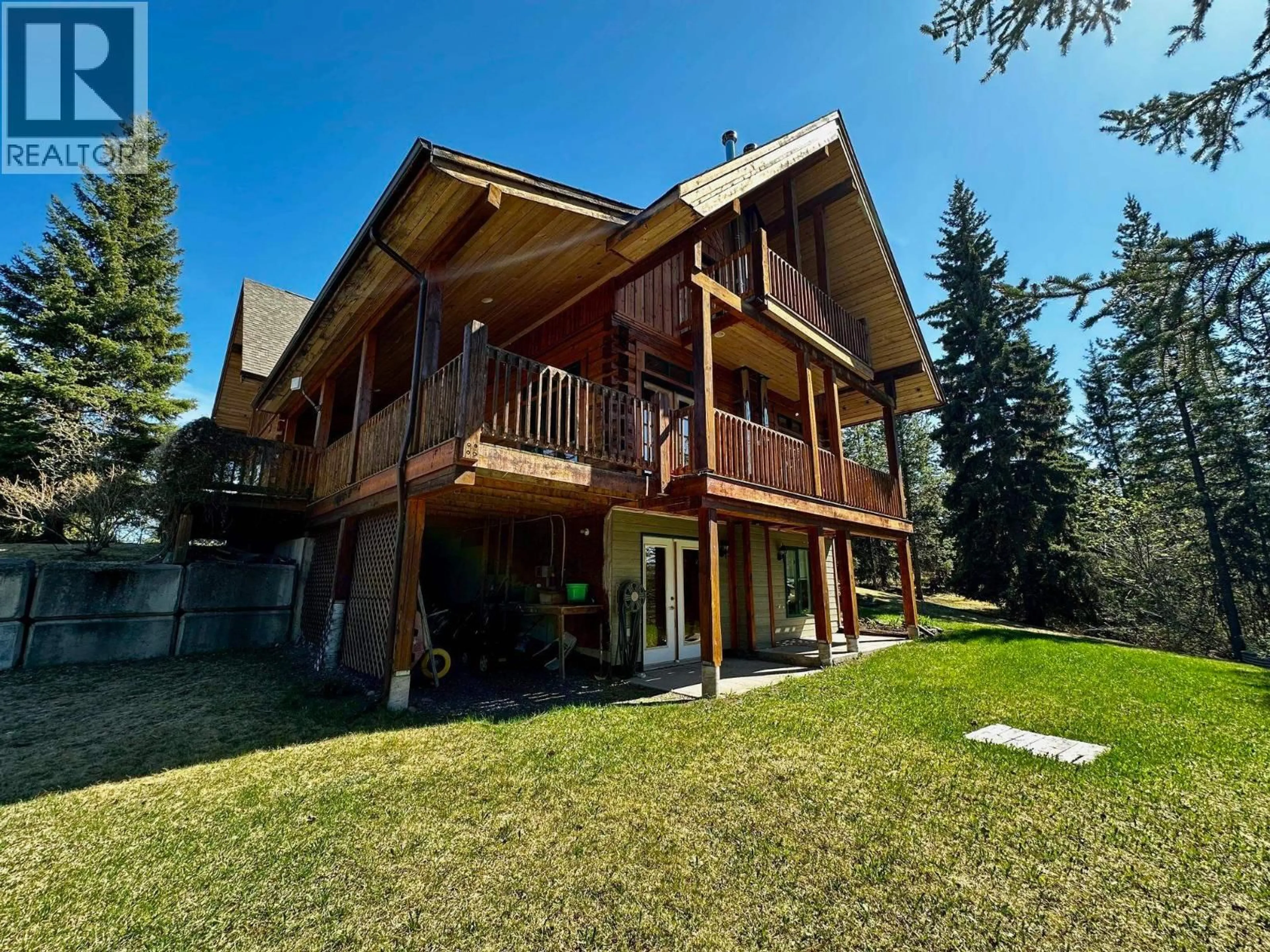 A pic from outside/outdoor area/front of a property/back of a property/a pic from drone, unknown for 2071 HIGHLAND ROAD, Smithers British Columbia V0J2N6