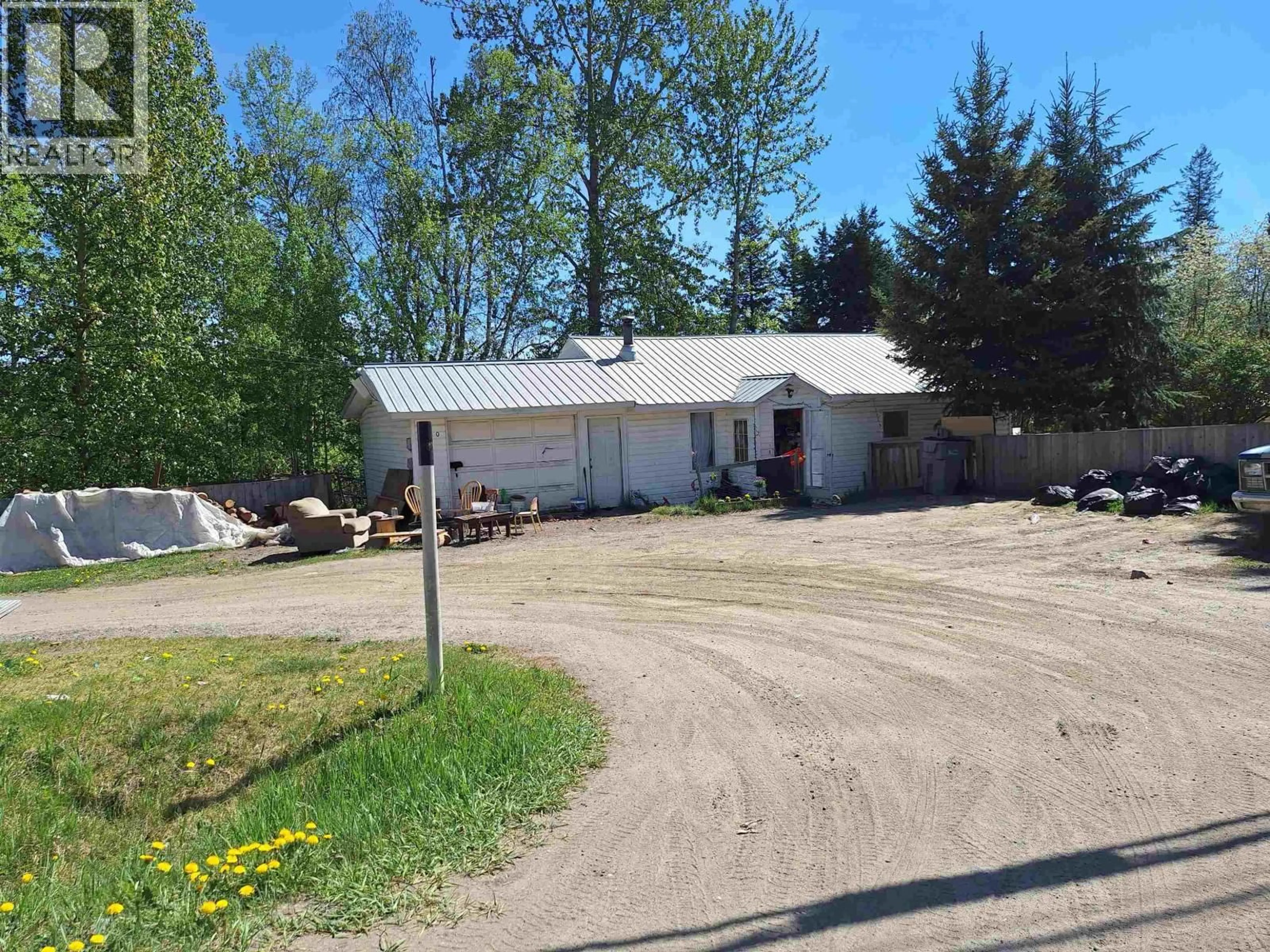 A pic from outside/outdoor area/front of a property/back of a property/a pic from drone, street for 2 - 1060 WEST FRASER ROAD, Quesnel British Columbia V2J6G7