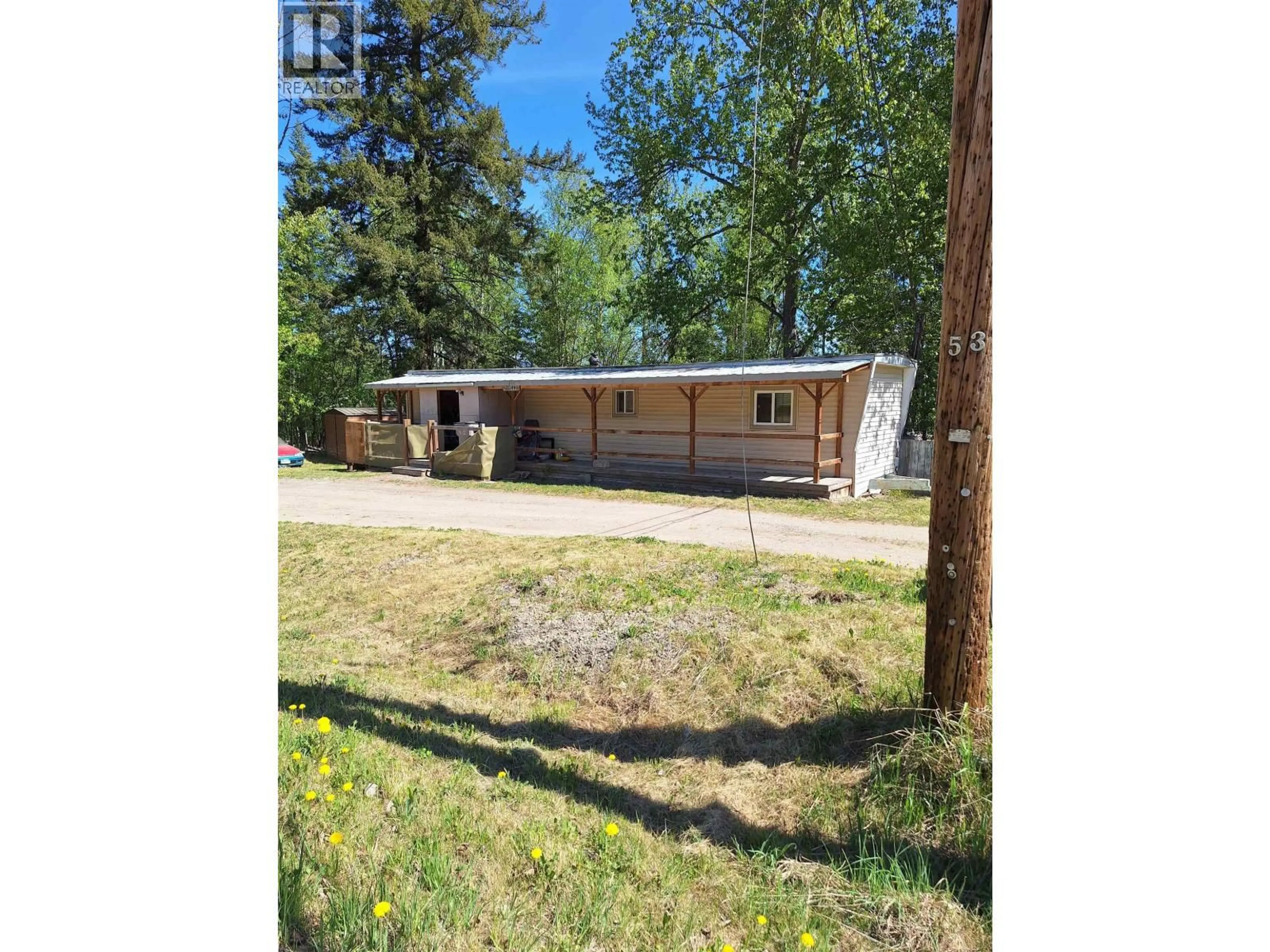 A pic from outside/outdoor area/front of a property/back of a property/a pic from drone, street for 2 - 1060 WEST FRASER ROAD, Quesnel British Columbia V2J6G7