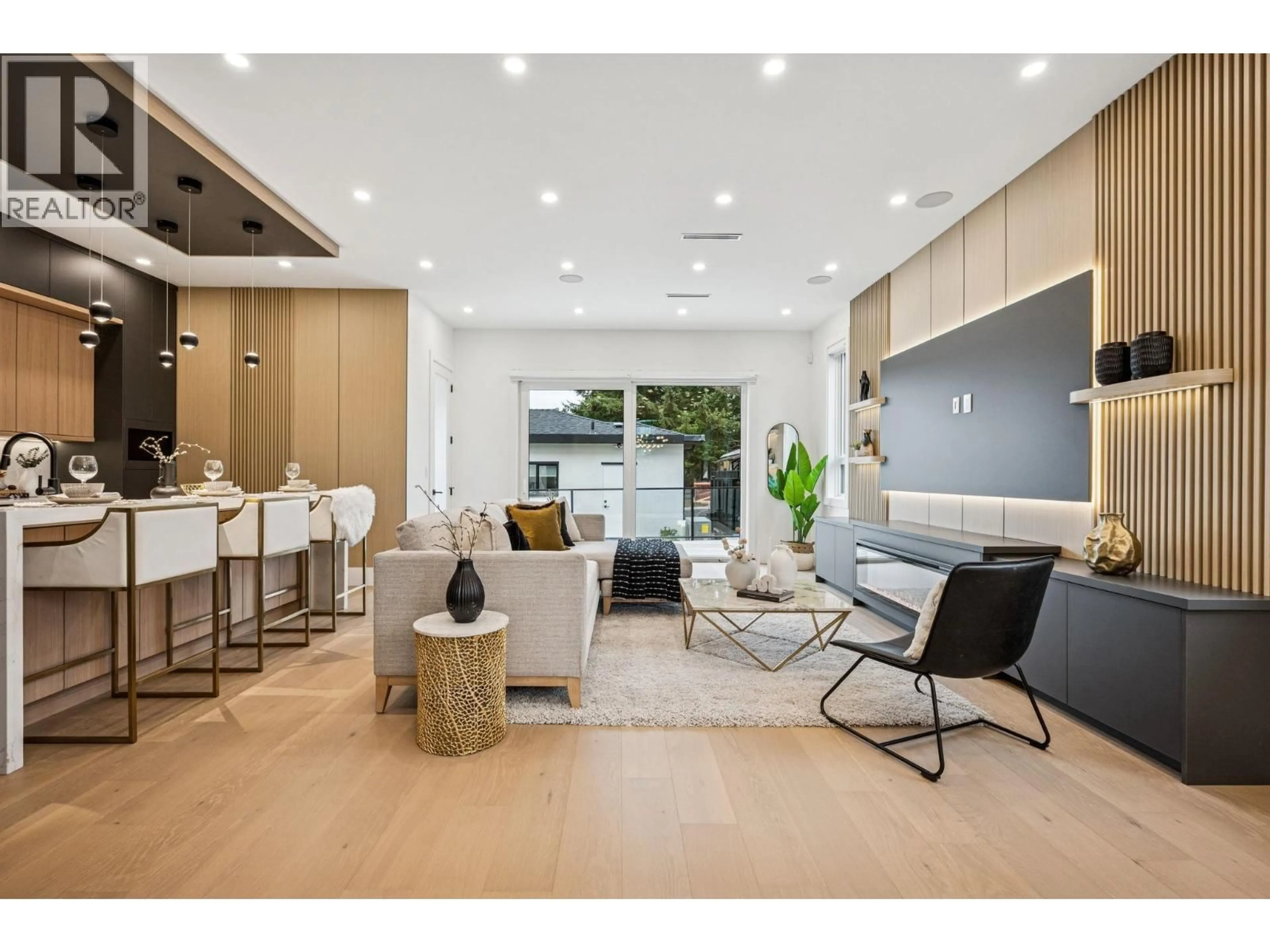 Living room with furniture, wood/laminate floor for 1 - 6362 CURTIS STREET, Burnaby British Columbia V5B2A5