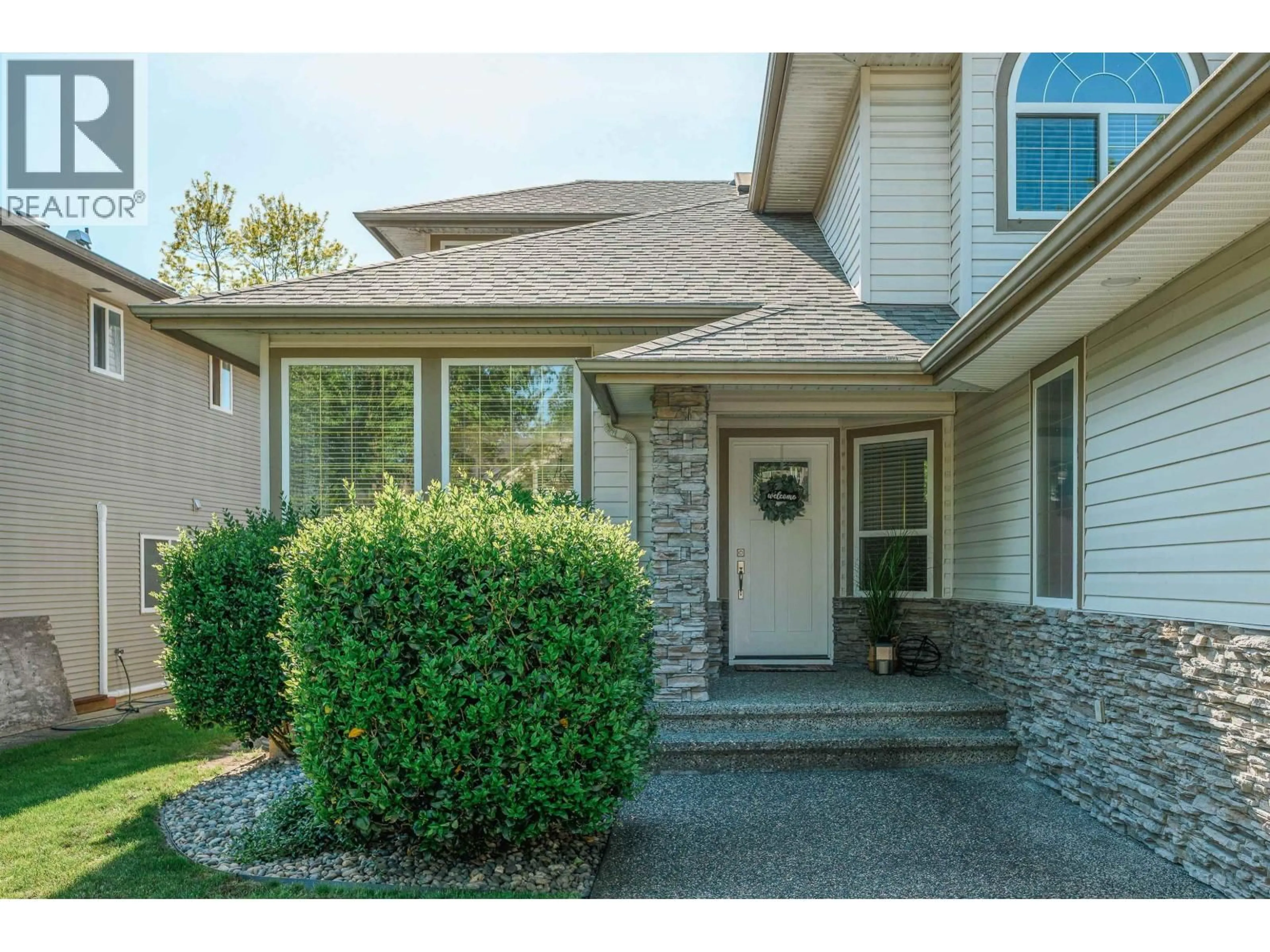 Home with vinyl exterior material, street for 11039 238 STREET, Maple Ridge British Columbia V2W1E7