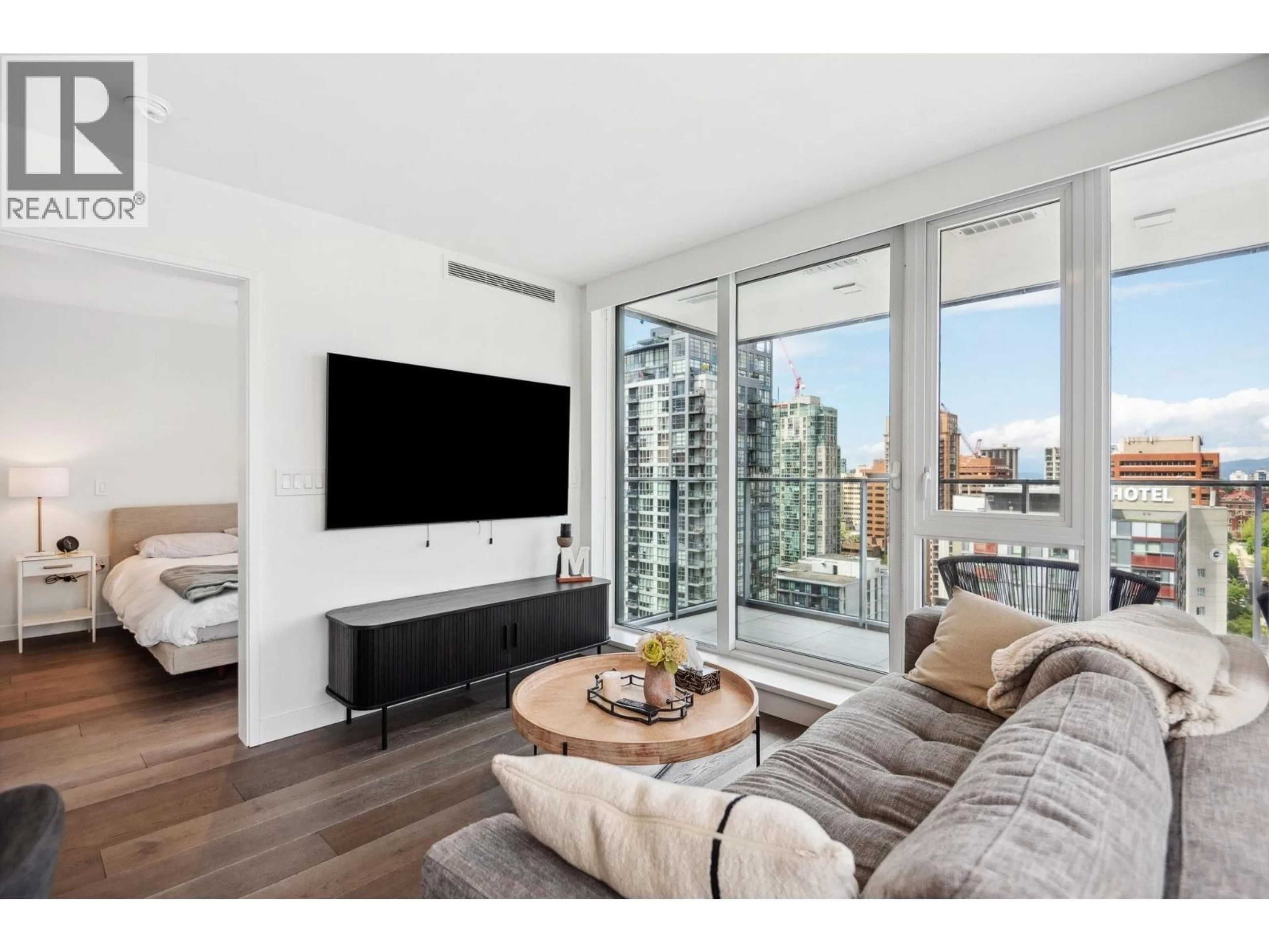 Living room with furniture, wood/laminate floor for 2002 - 1111 RICHARDS STREET, Vancouver British Columbia V6B0S3