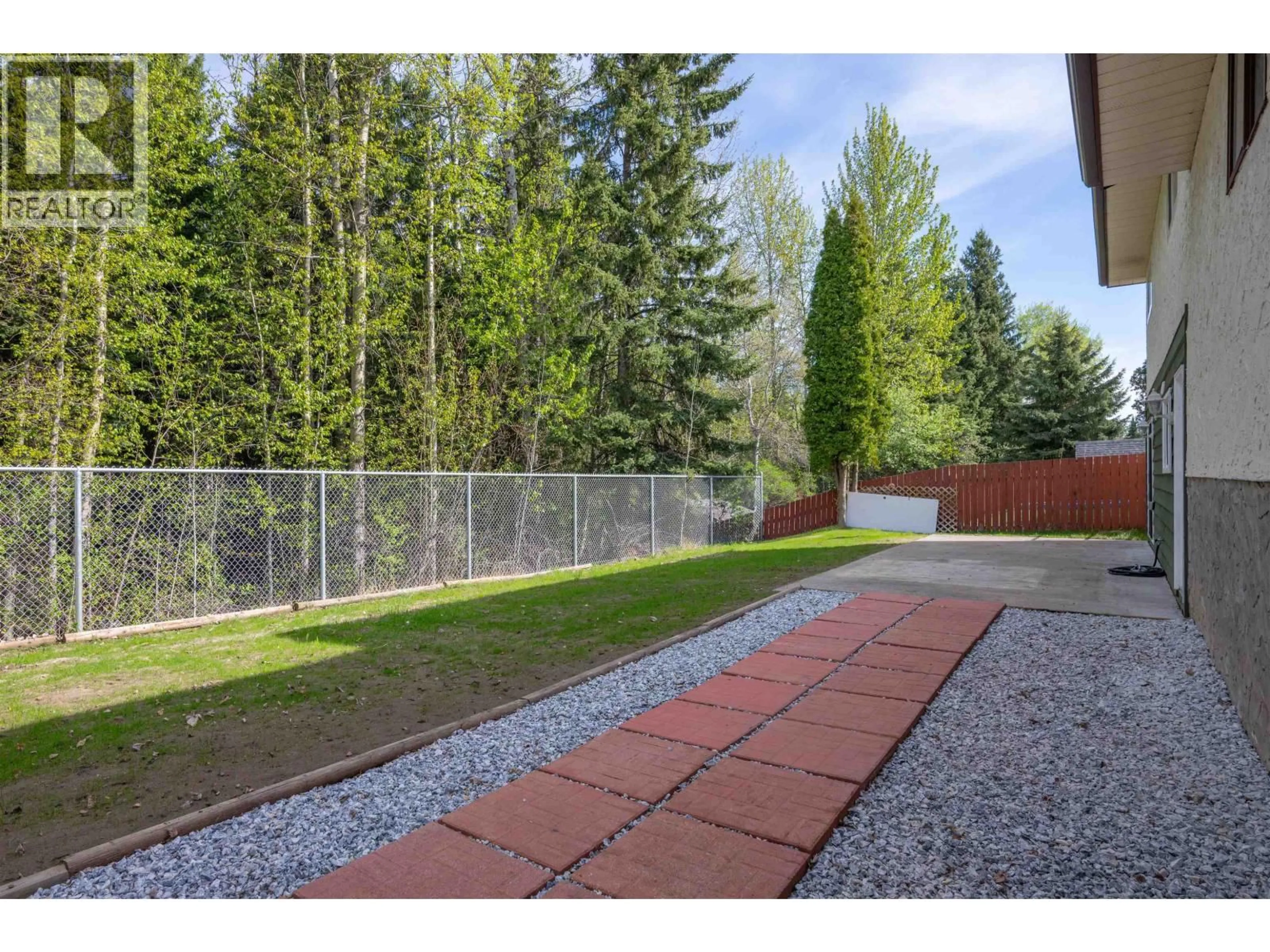 Patio, forest/trees view for 8272 ST JOHN CRESCENT, Prince George British Columbia V2N4H8