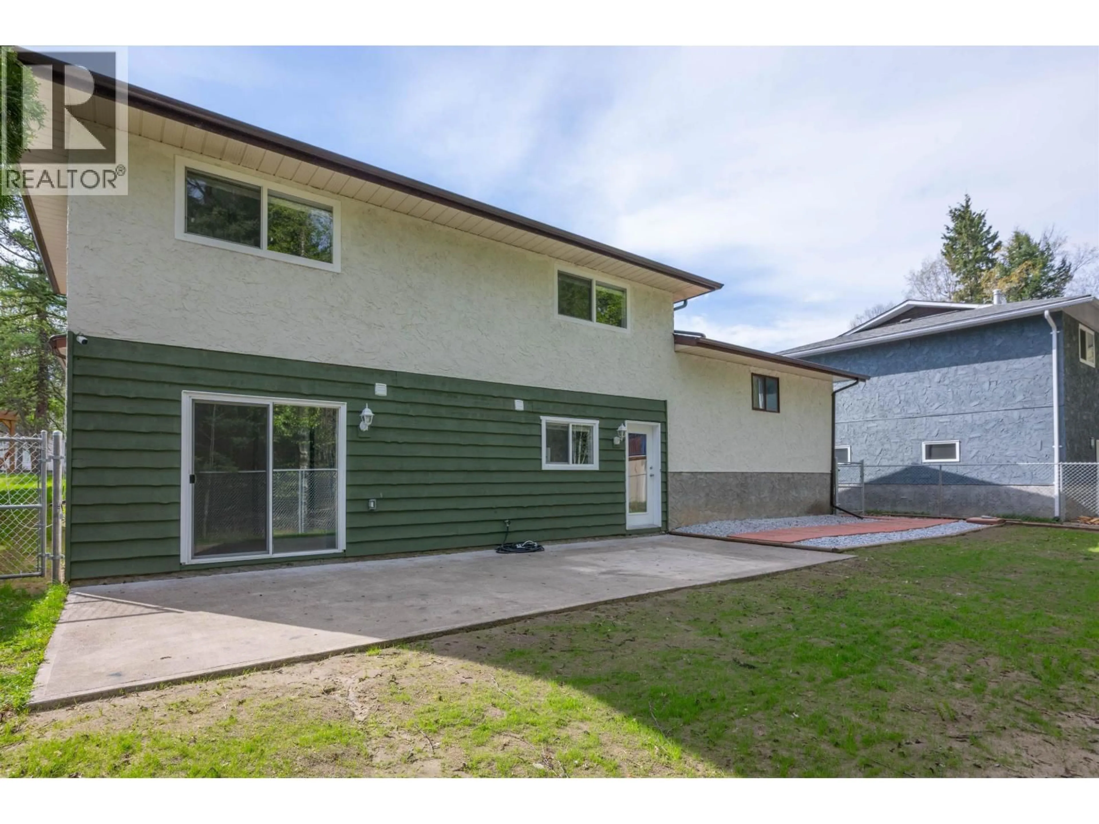 A pic from outside/outdoor area/front of a property/back of a property/a pic from drone, street for 8272 ST JOHN CRESCENT, Prince George British Columbia V2N4H8