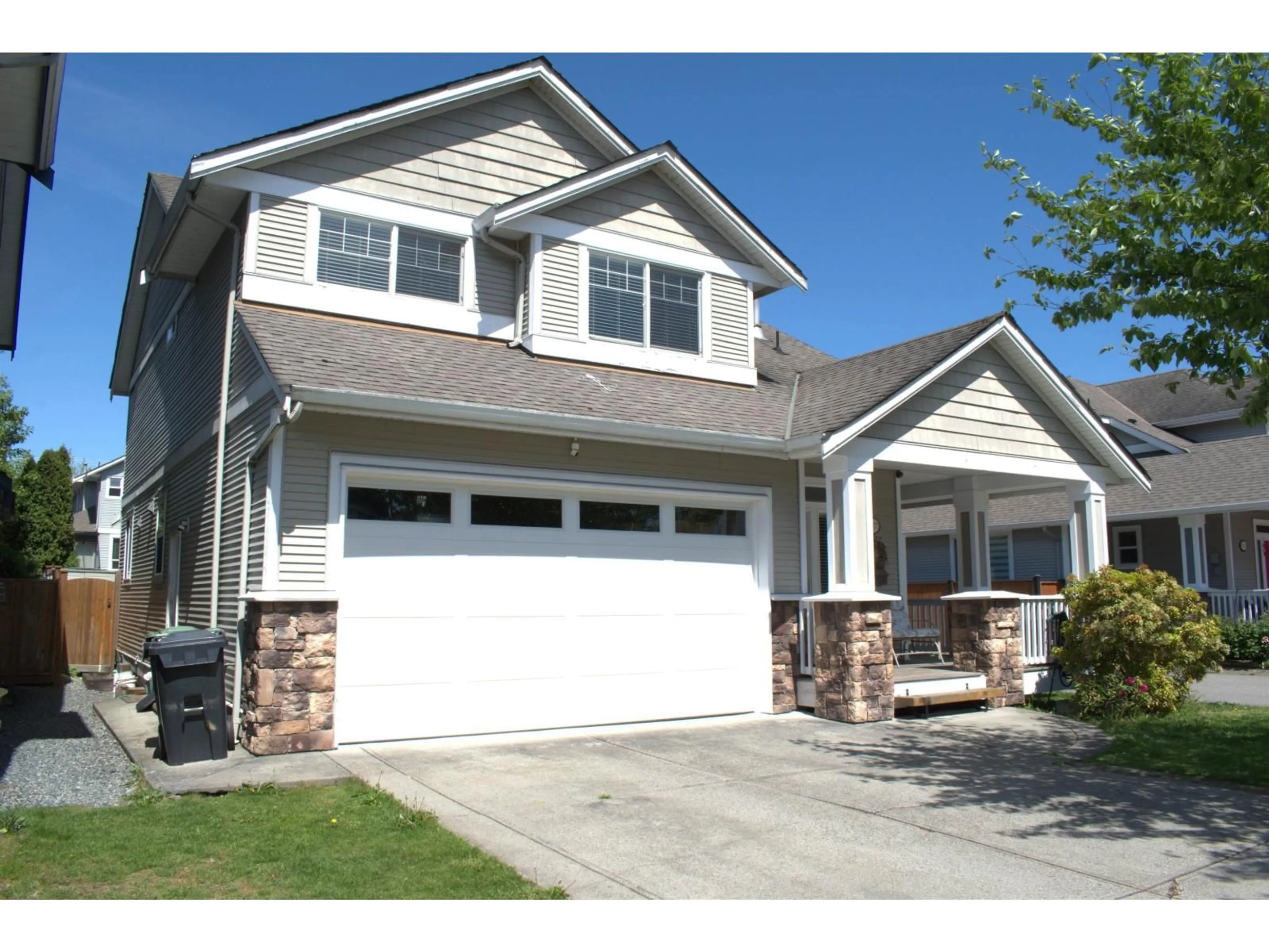 Home with vinyl exterior material, street for 20177 71A AVENUE, Langley British Columbia V2Y3A1