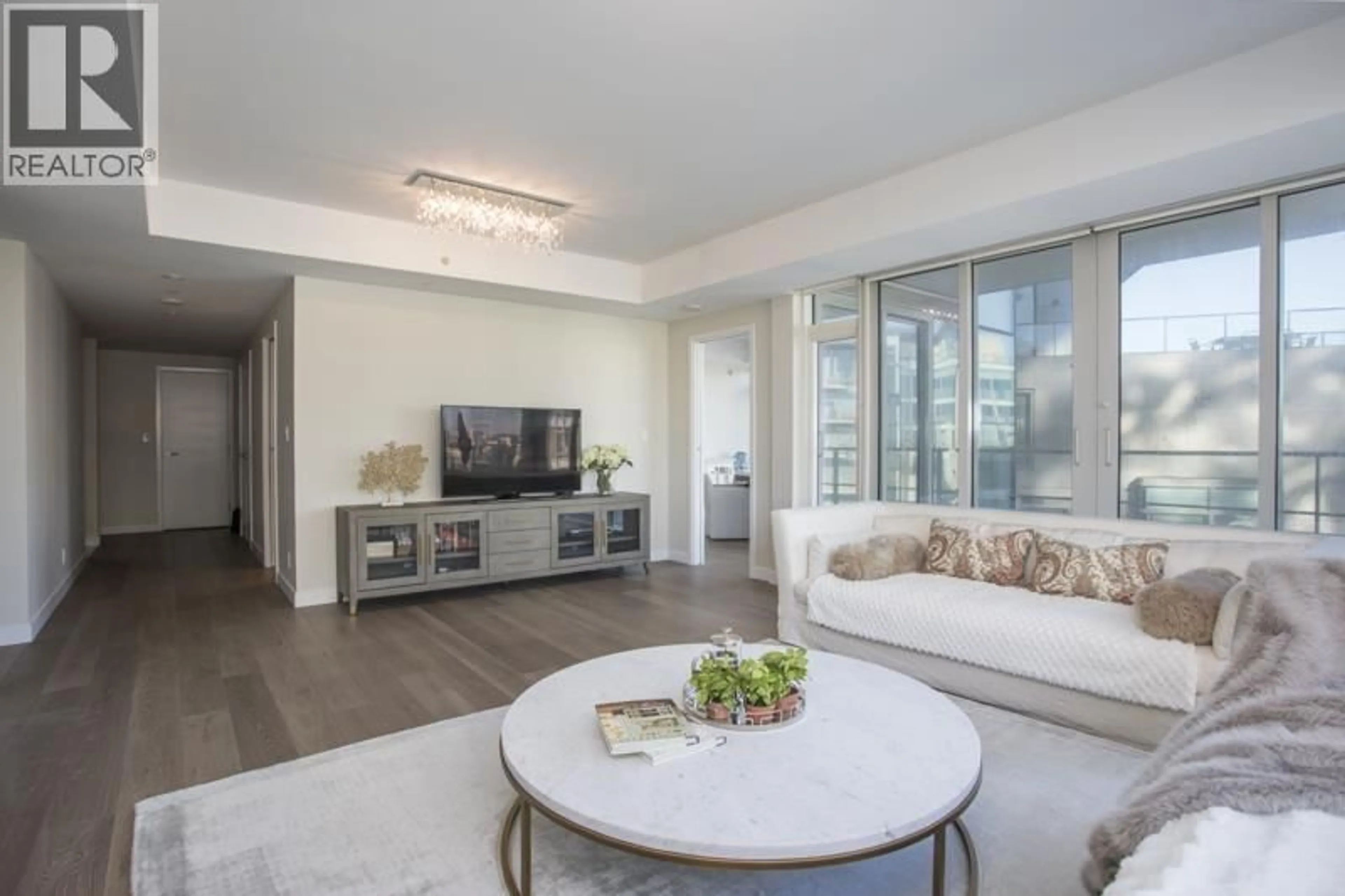 Living room with furniture, unknown for 702 - 5171 BRIGHOUSE WAY, Richmond British Columbia V7C0A6