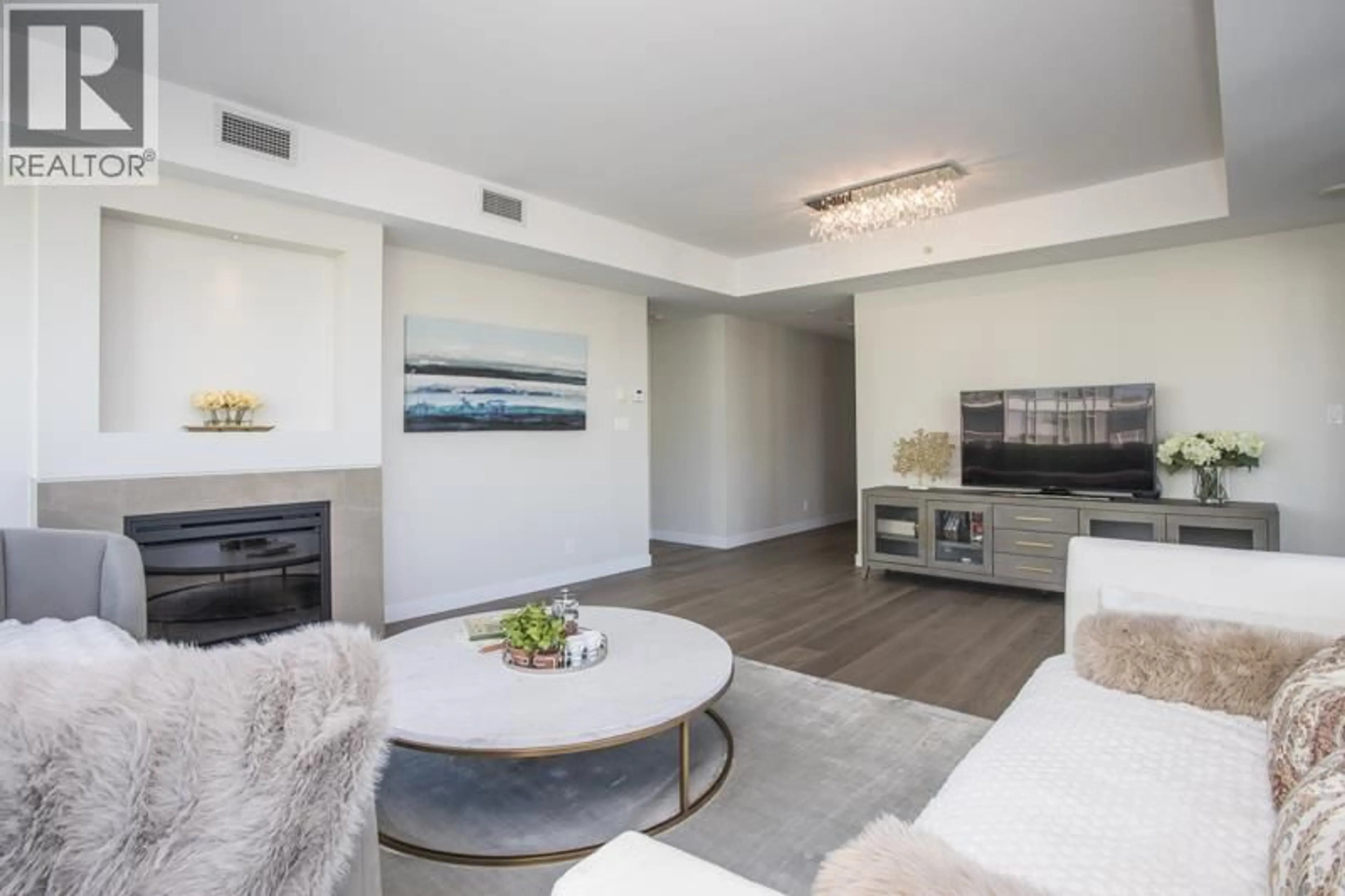 Living room with furniture, unknown for 702 - 5171 BRIGHOUSE WAY, Richmond British Columbia V7C0A6