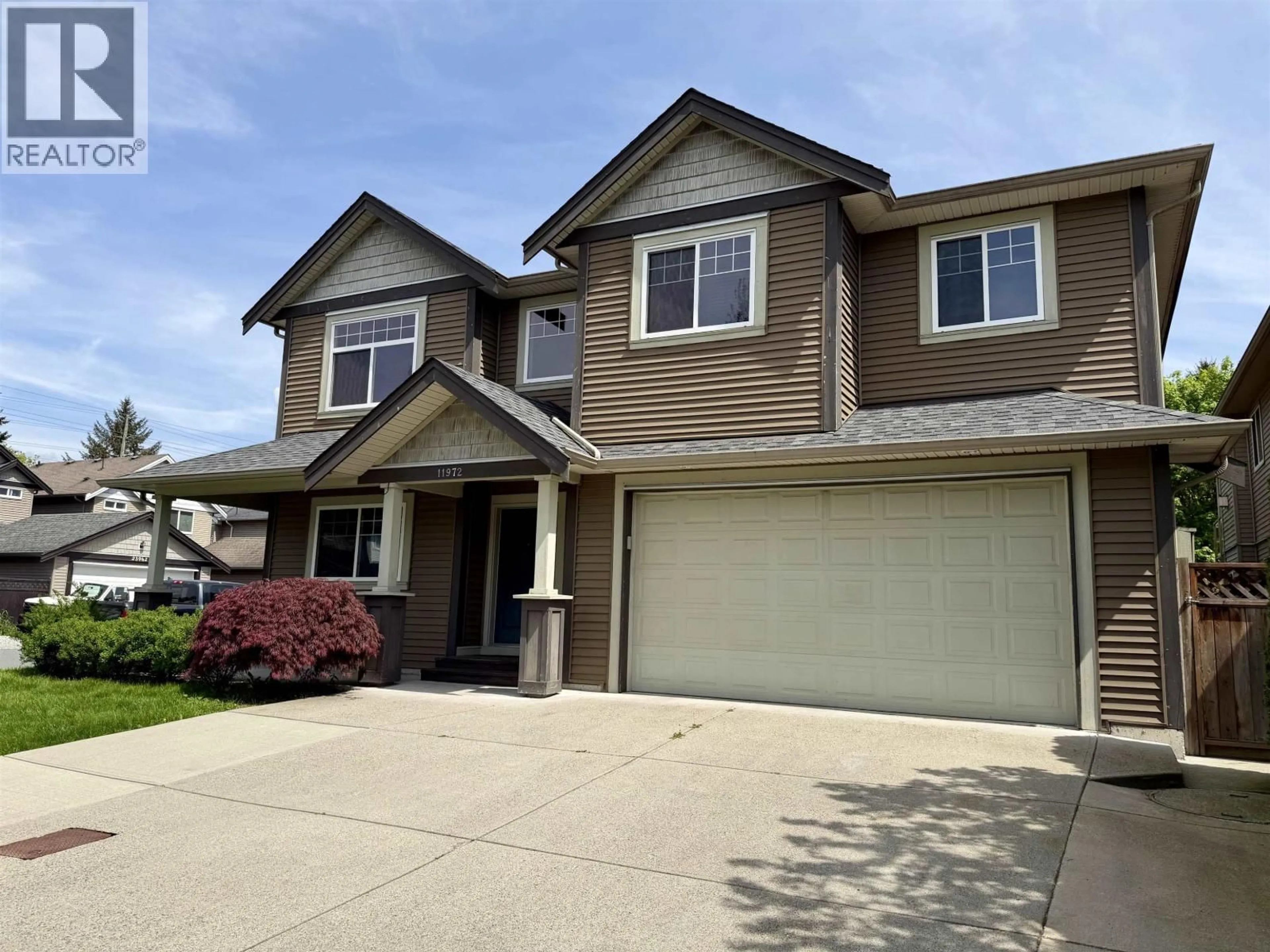 Home with vinyl exterior material, street for 11972 239 STREET, Maple Ridge British Columbia V4R1W4
