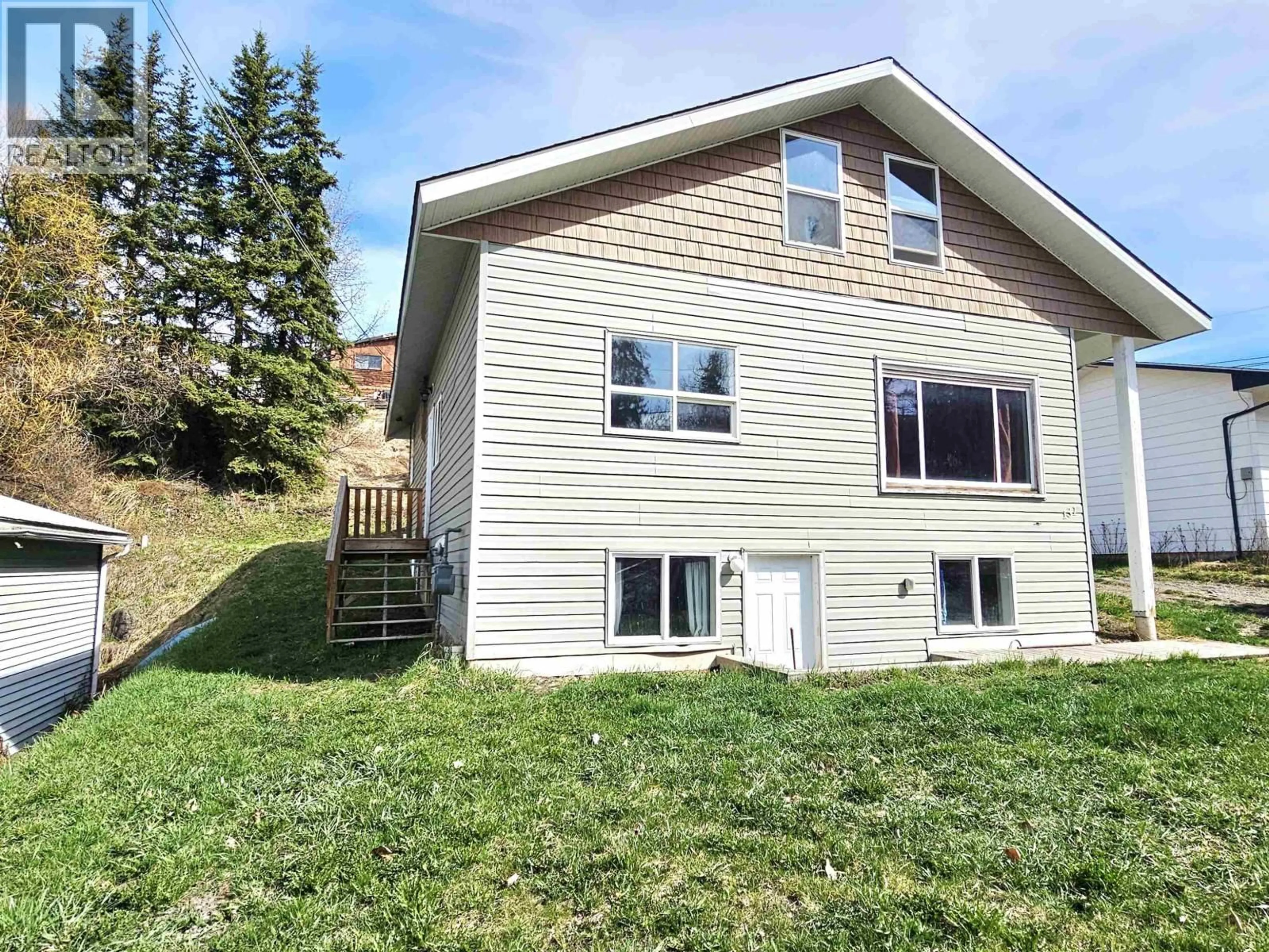 Home with vinyl exterior material, mountain view for 131 6TH AVENUE, Burns Lake British Columbia V0J1E0