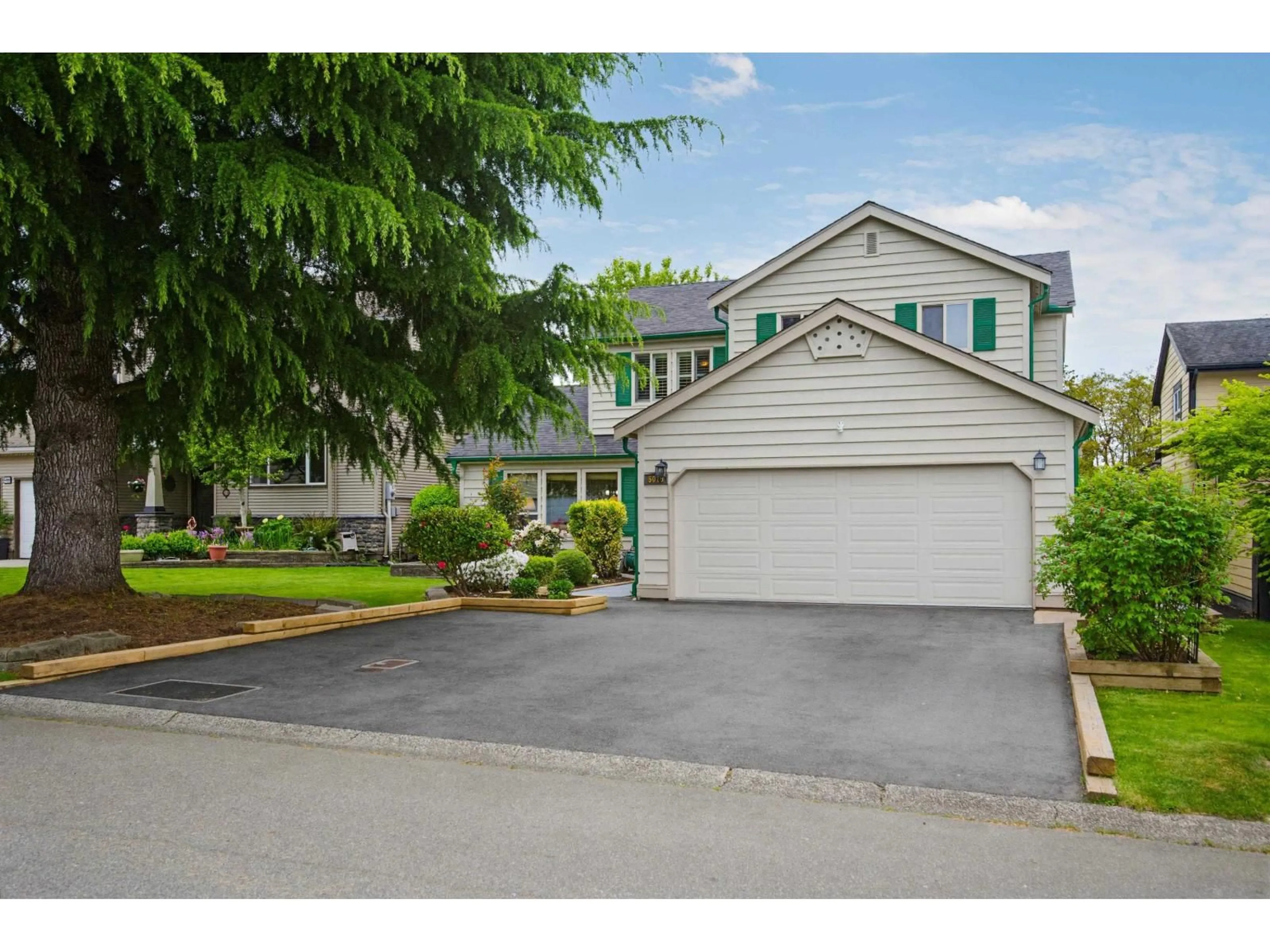 Home with vinyl exterior material, street for 5019 200B STREET, Langley British Columbia V3A7J1