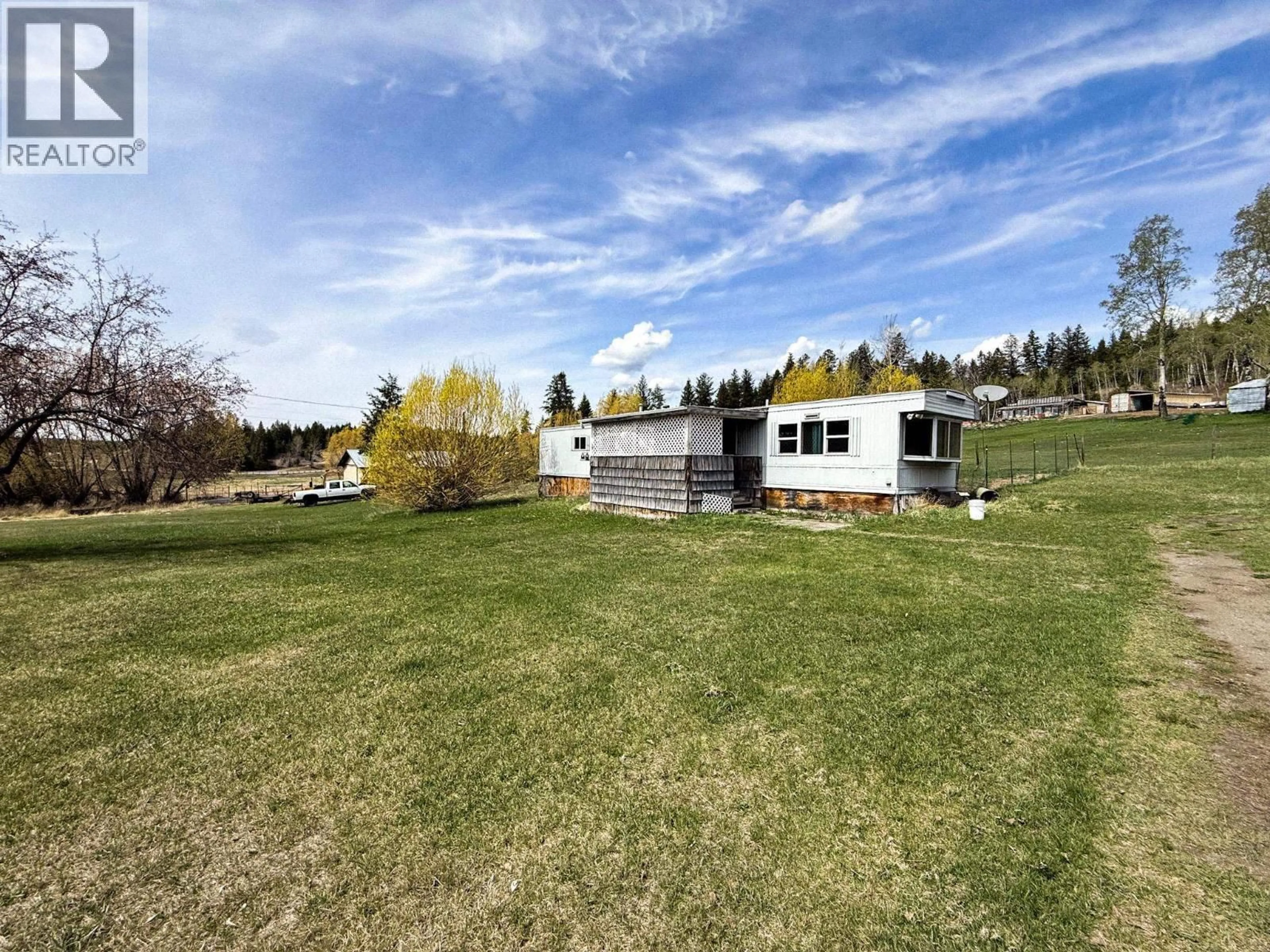 A pic from outside/outdoor area/front of a property/back of a property/a pic from drone, mountain view for 3733 S CARIBOO 97 HIGHWAY, Lac La Hache British Columbia V0K1T0