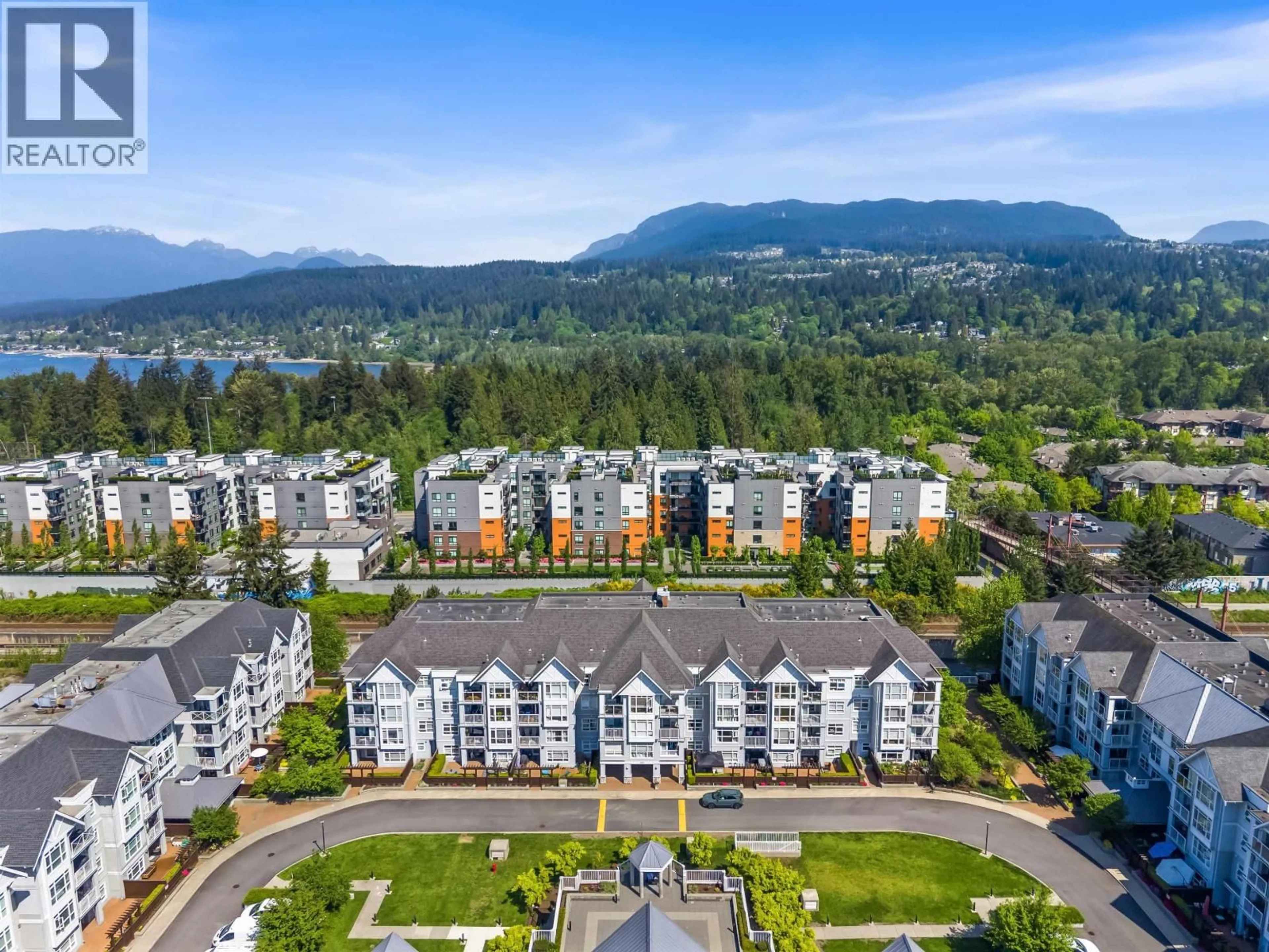 A pic from outside/outdoor area/front of a property/back of a property/a pic from drone, water/lake/river/ocean view for 302 - 3142 ST JOHNS STREET, Port Moody British Columbia V3H5E5