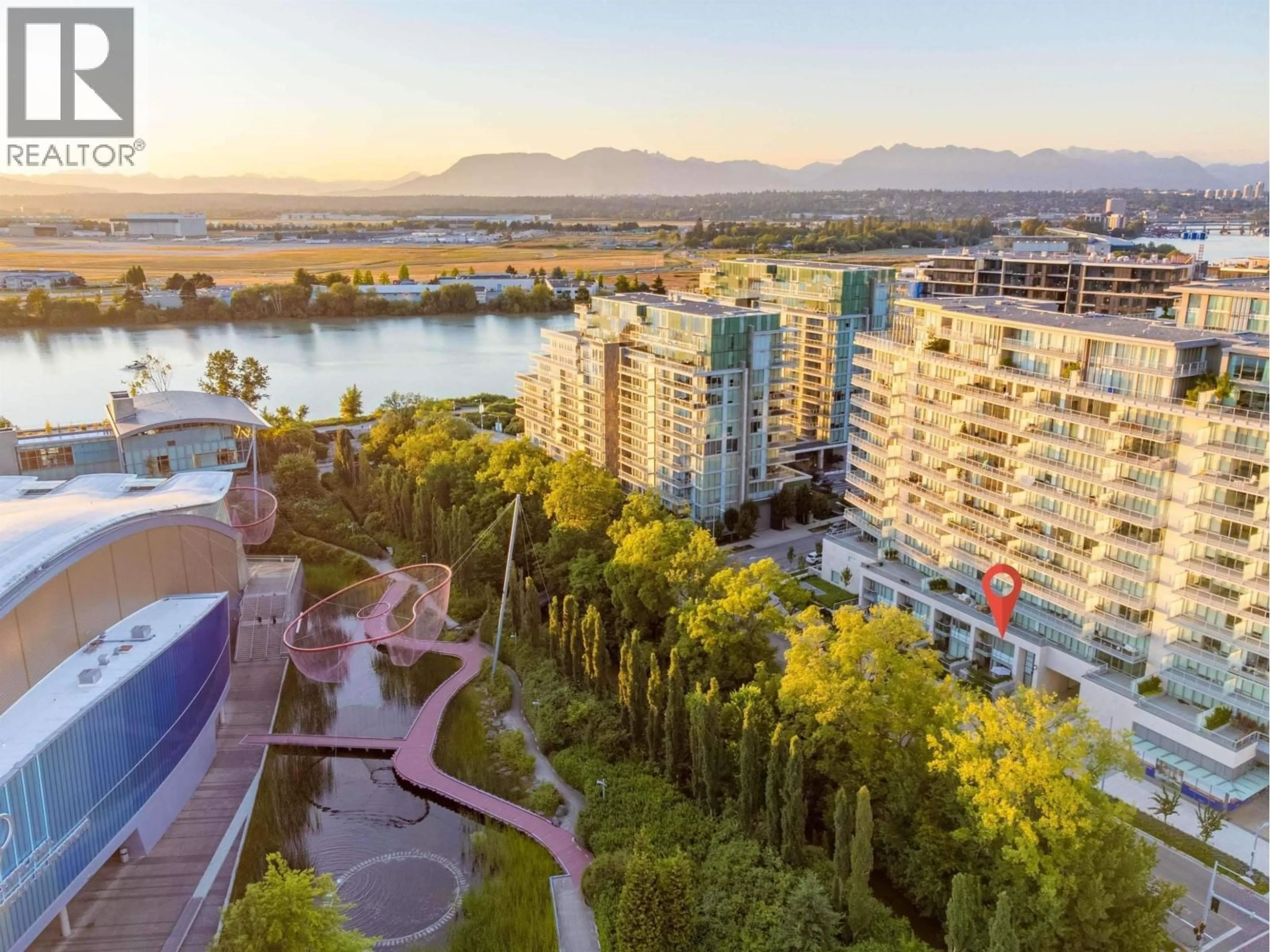 A pic from outside/outdoor area/front of a property/back of a property/a pic from drone, water/lake/river/ocean view for 203 - 6622 PEARSON WAY, Richmond British Columbia V7C0E4