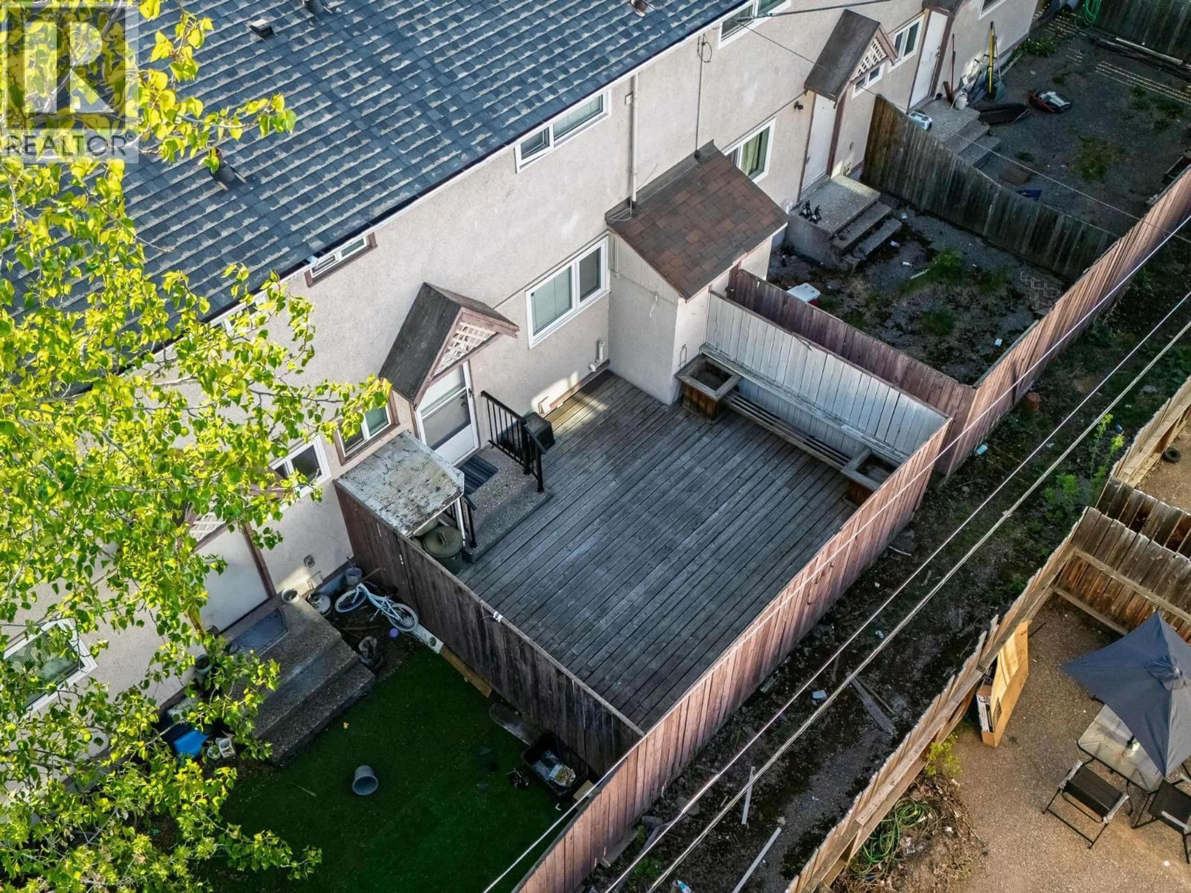 A pic from outside/outdoor area/front of a property/back of a property/a pic from drone, city buildings view from balcony for H104 - 1900 STRATHCONA AVENUE, Prince George British Columbia V2L2V9