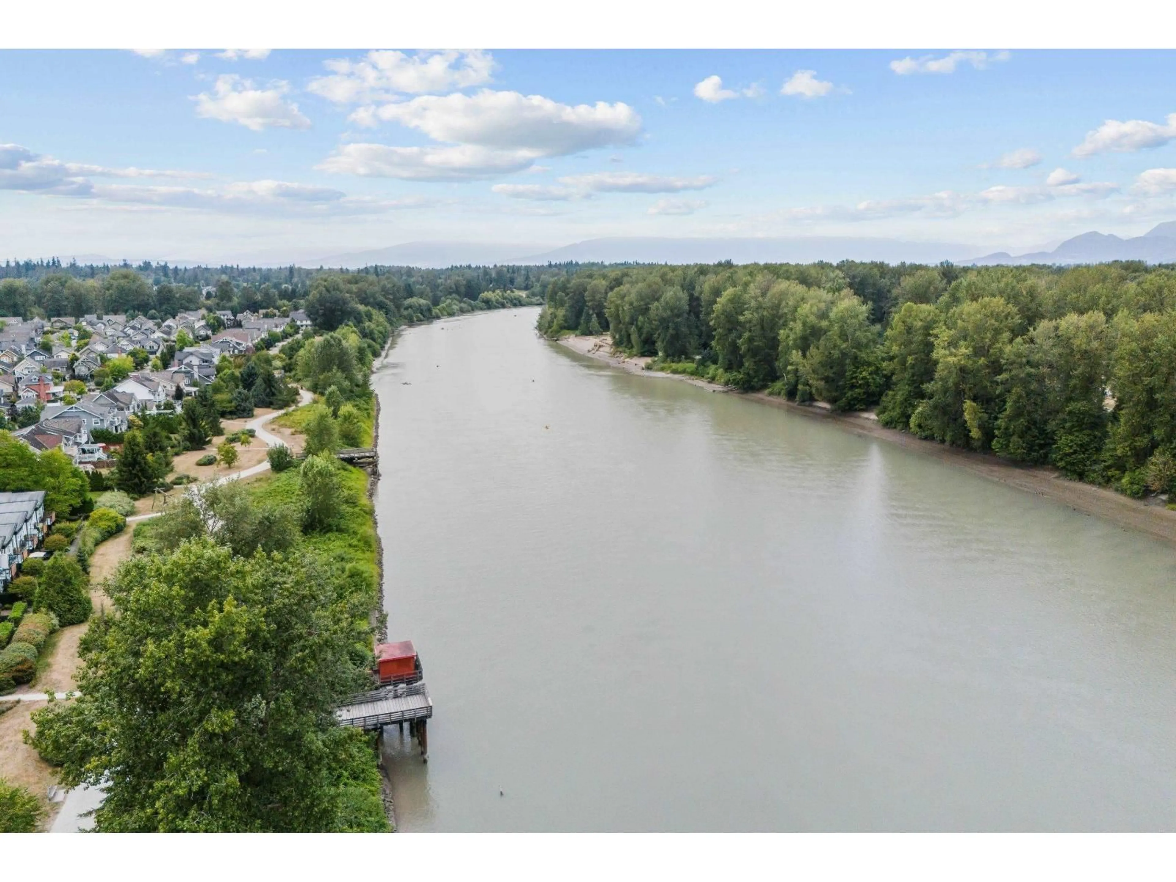 A pic from outside/outdoor area/front of a property/back of a property/a pic from drone, water/lake/river/ocean view for 307 - 23255 BILLY BROWN ROAD, Langley British Columbia V1M0C8