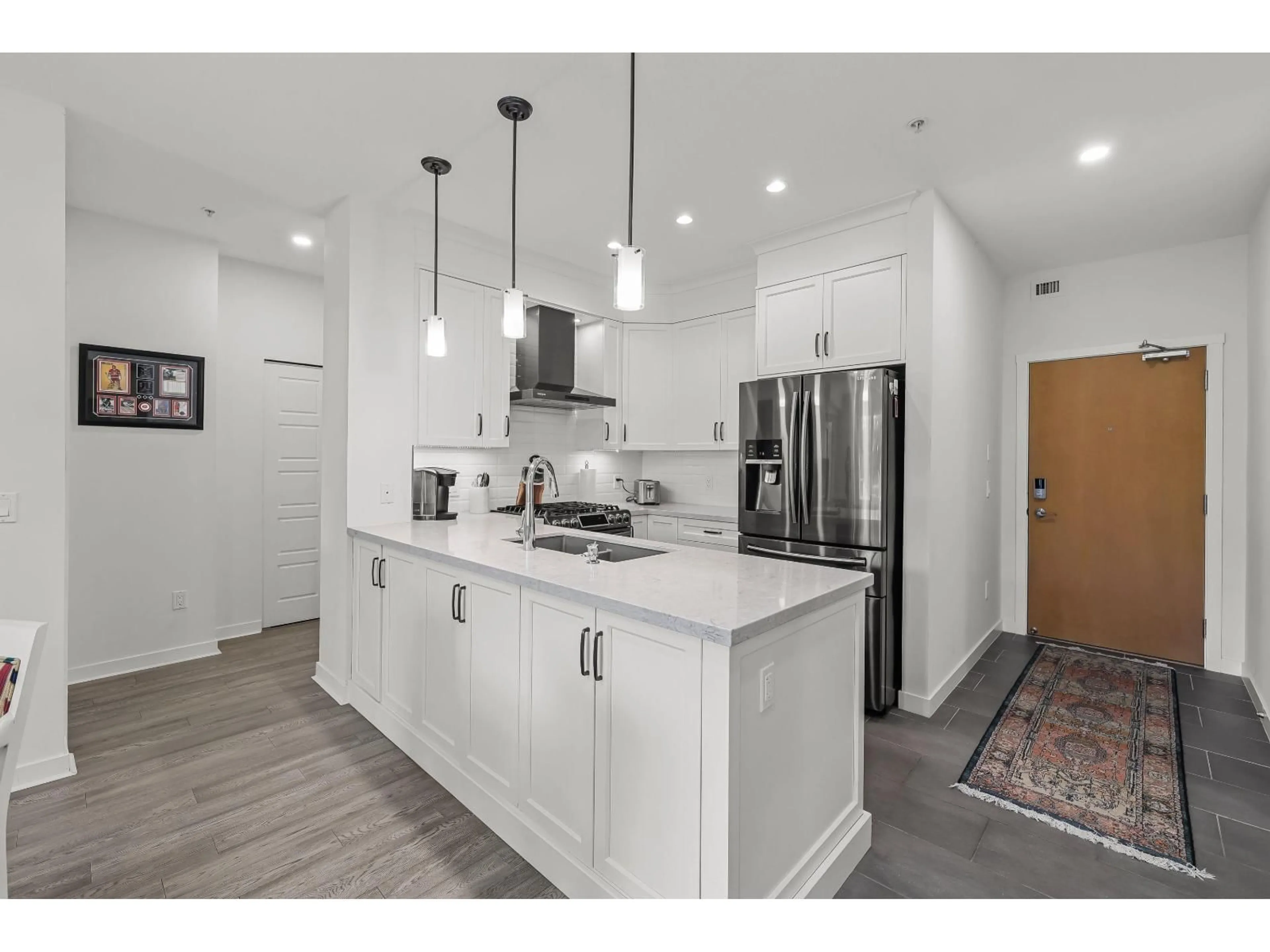 Open concept kitchen, unknown for 307 - 23255 BILLY BROWN ROAD, Langley British Columbia V1M0C8
